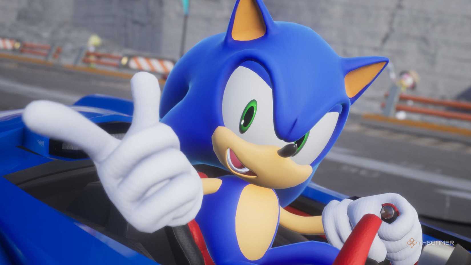 Sonic sitting in a race car at the start of a race in Sonic Racing CrossWorlds. He is pointing at the camera.