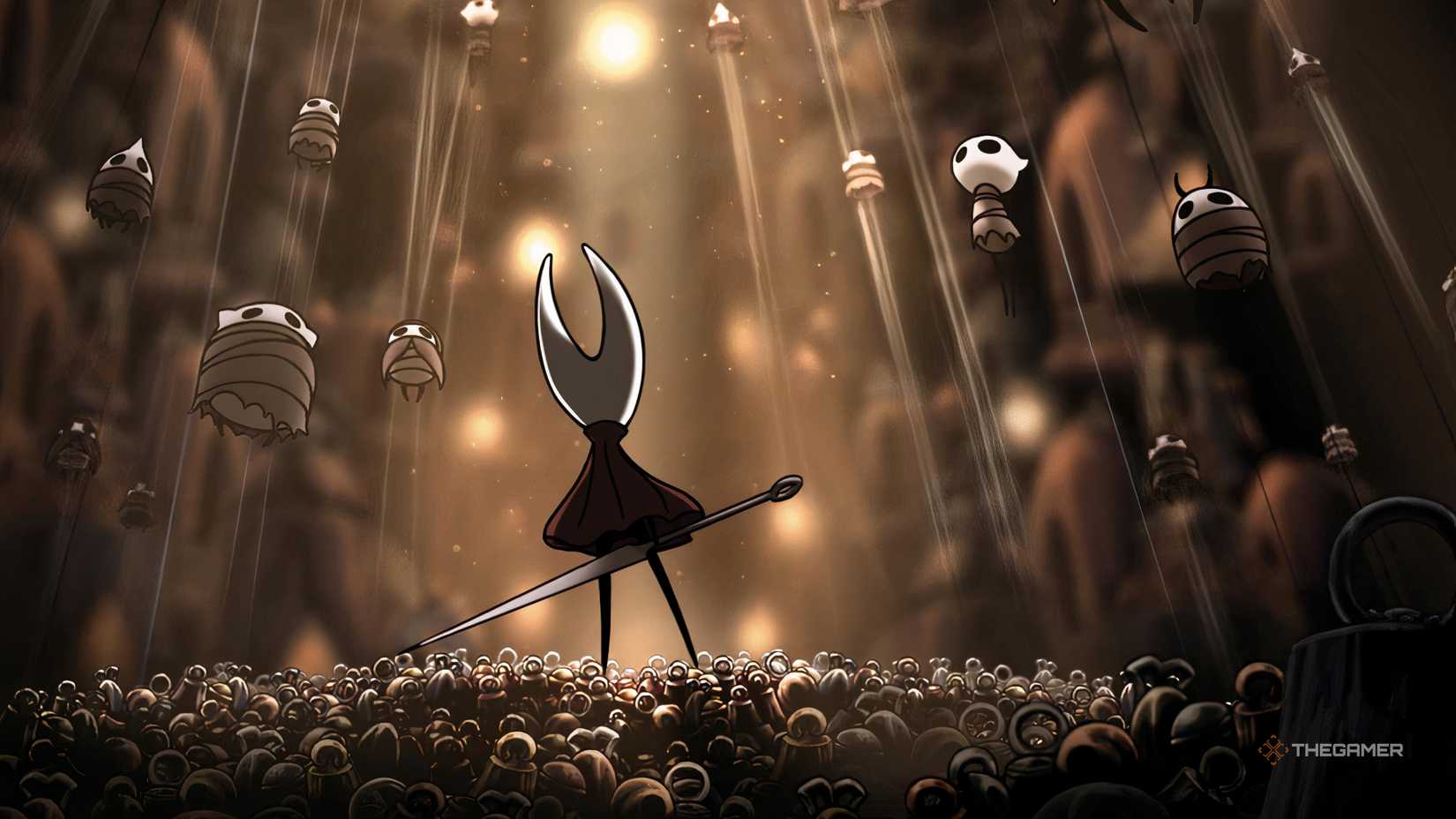 the hornet standing on bells staring up at a bunch of silked up bugs.