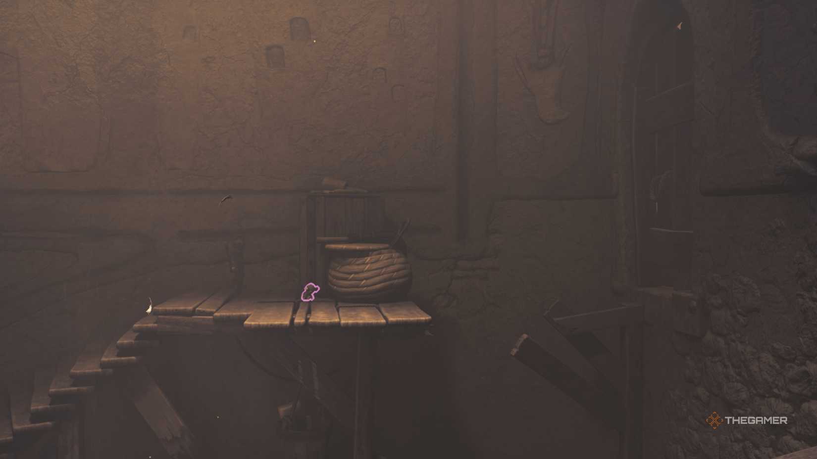 Alone standing next to a doll collectible at the top of the stairs in Little Nightmares 3.