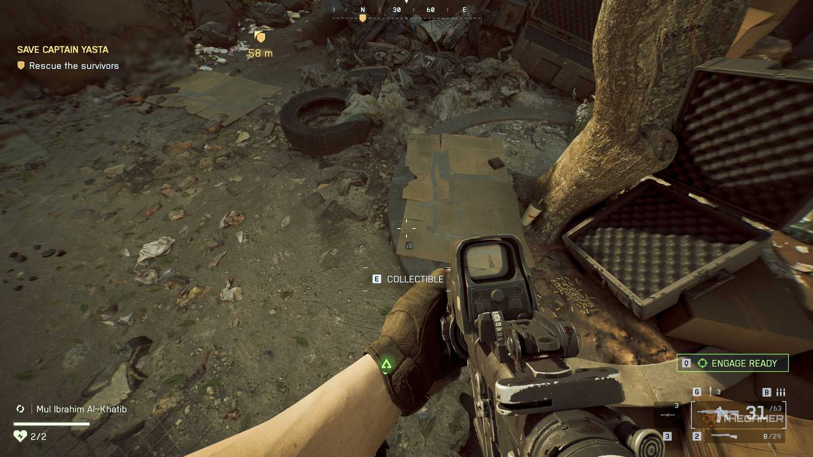 A Battlefield 6 player looking at a pair of dog tags on a flat cardboard box.