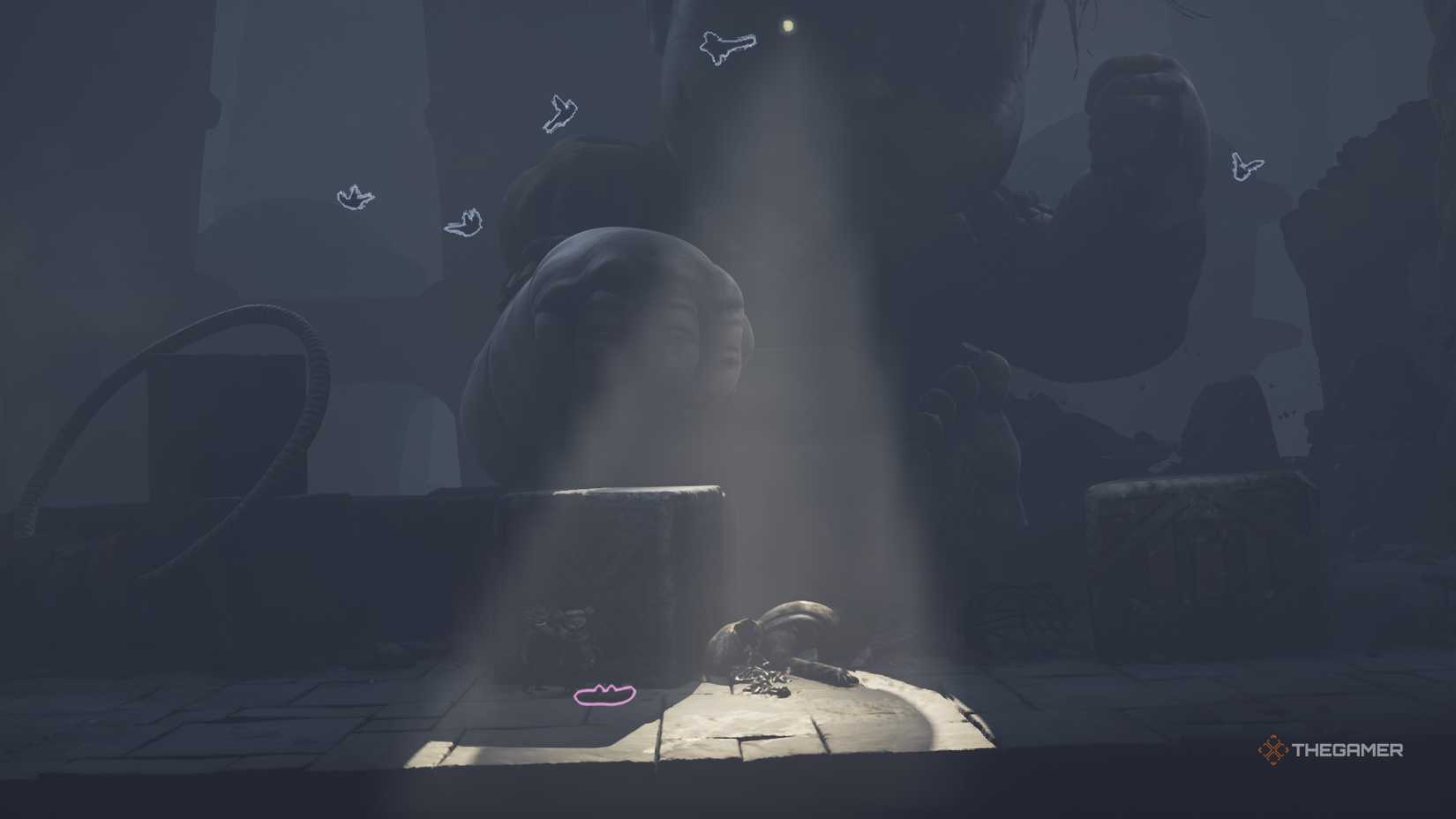 Low and Alone hiding from Monster Baby in Little Nightmares 3.