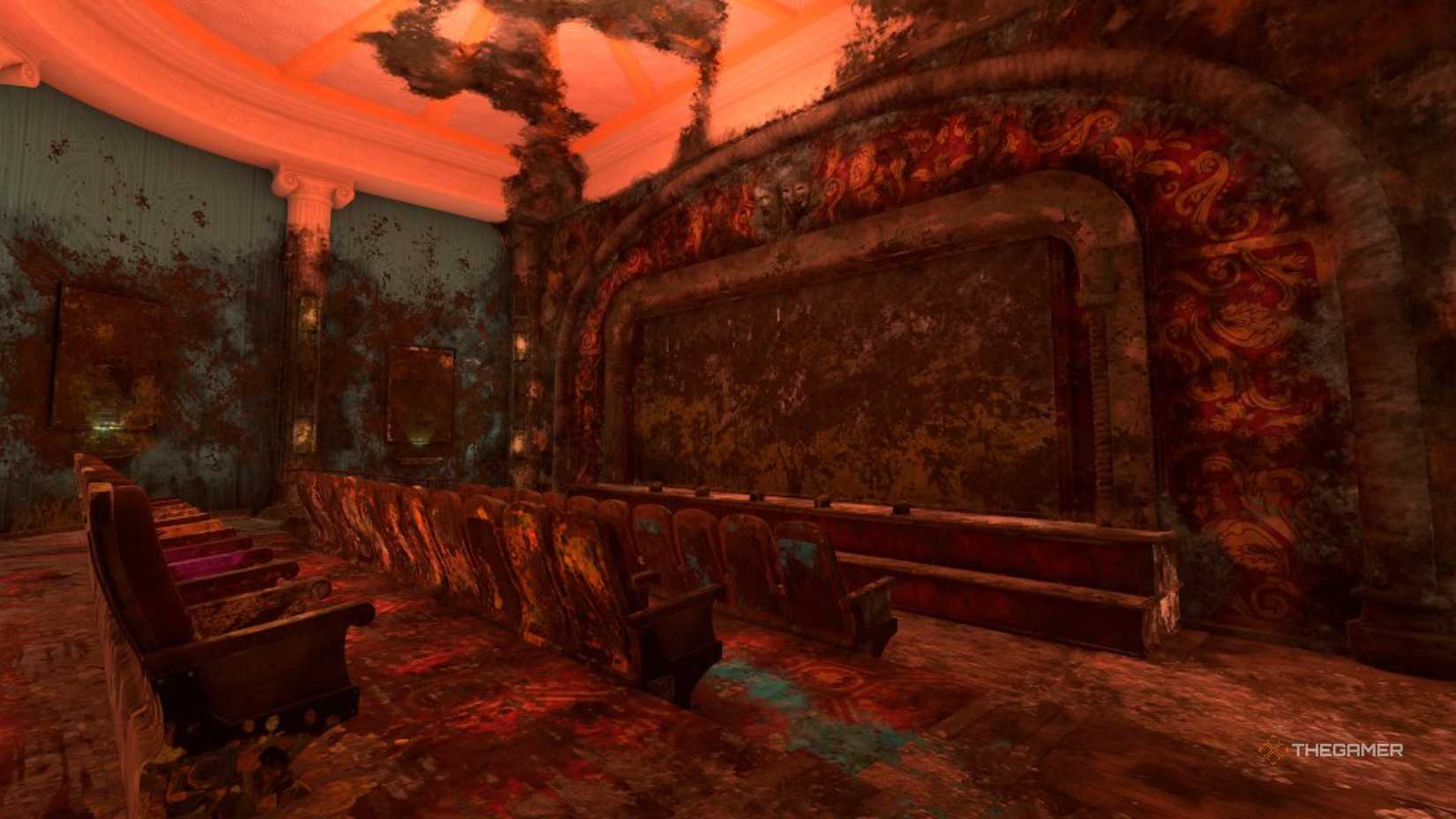 mold creeps up the ceiling of a dirty theater in powerwash simulator 2.