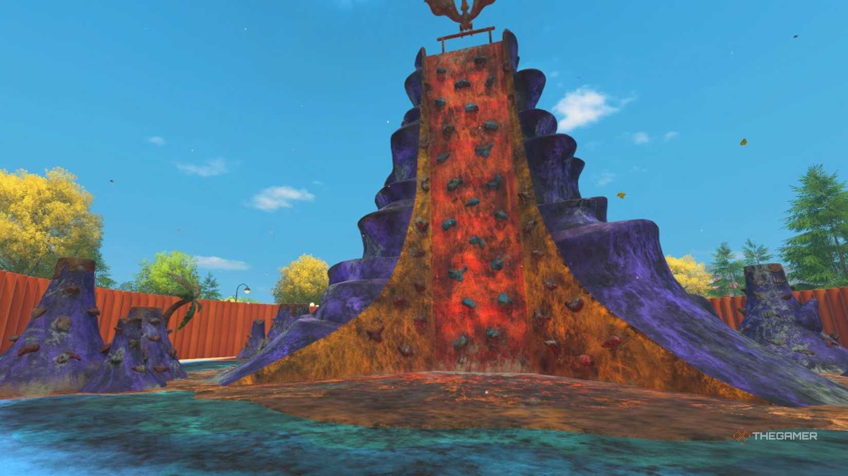 a dirty climbing wall has a pterodactyl statue on top in powerwash simulator 2.