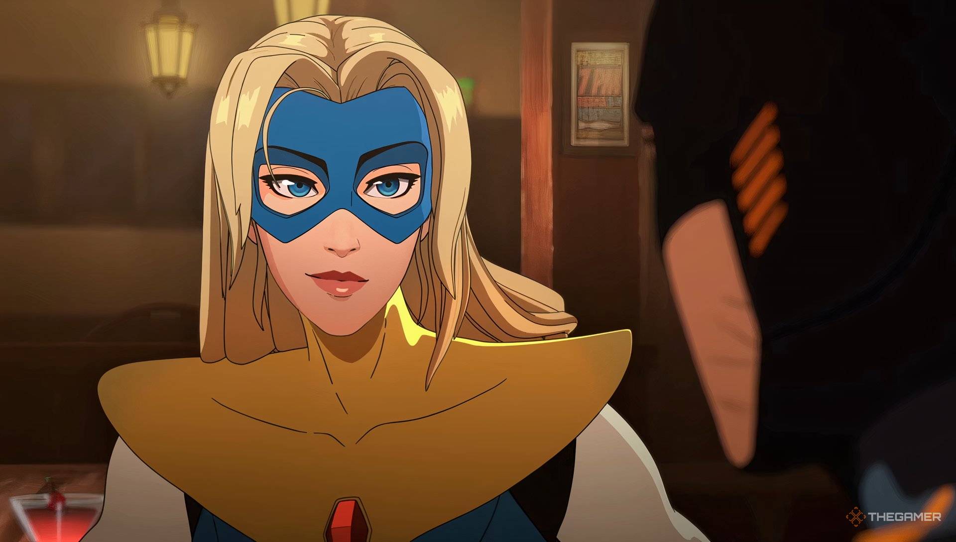 Blonde Blazer smirking in a bar in Dispatch.