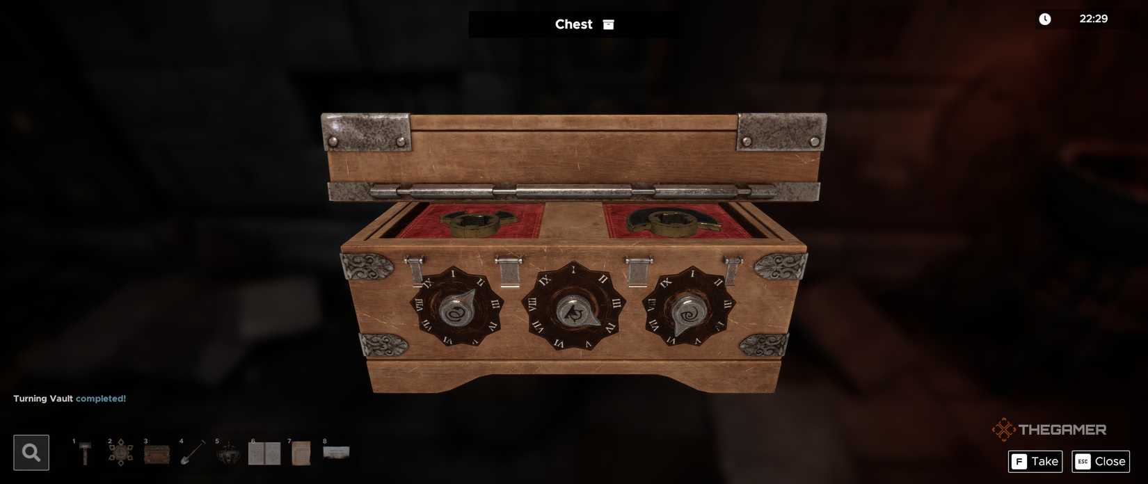 The symbolic dials on the chest in Dracula's Courtyard in Escape Simulator 2.