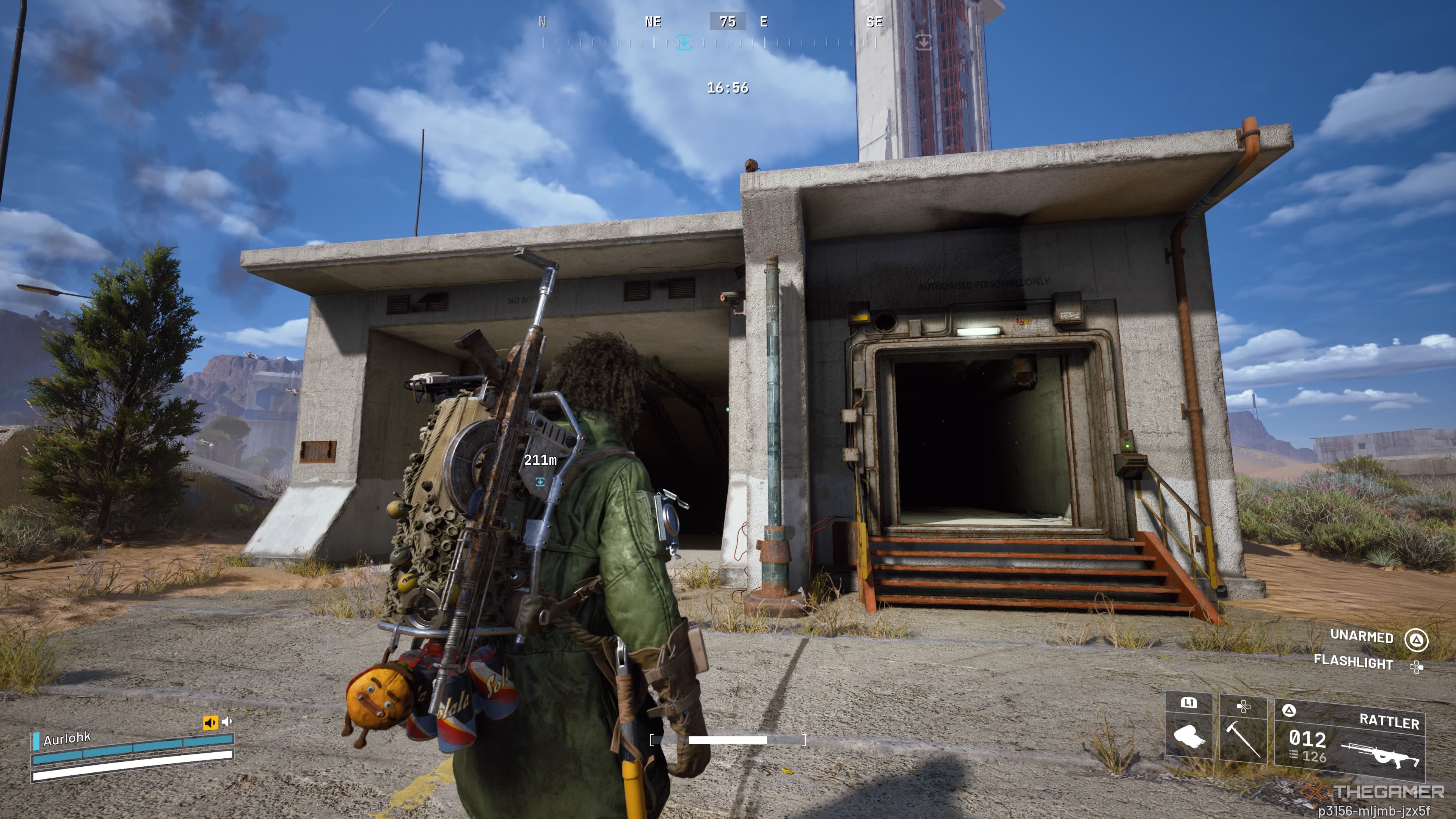 Player raider standing in front of a small building with two entrances to the Spaceport tunnels in Arc Raiders.