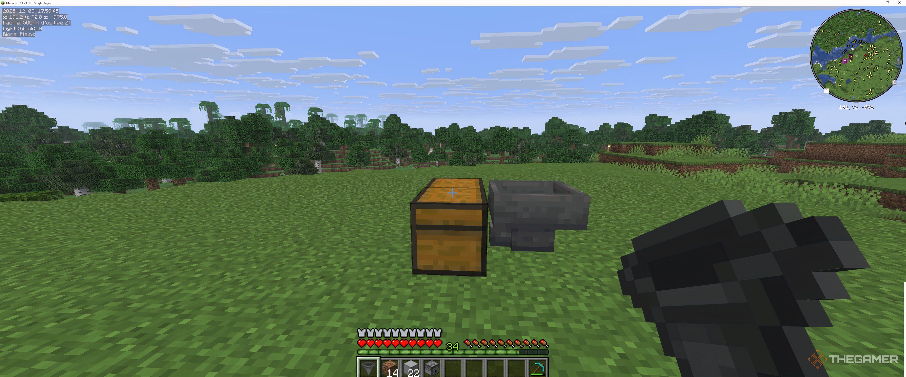 A close up of a dispenser going into a chest in Minecraft.