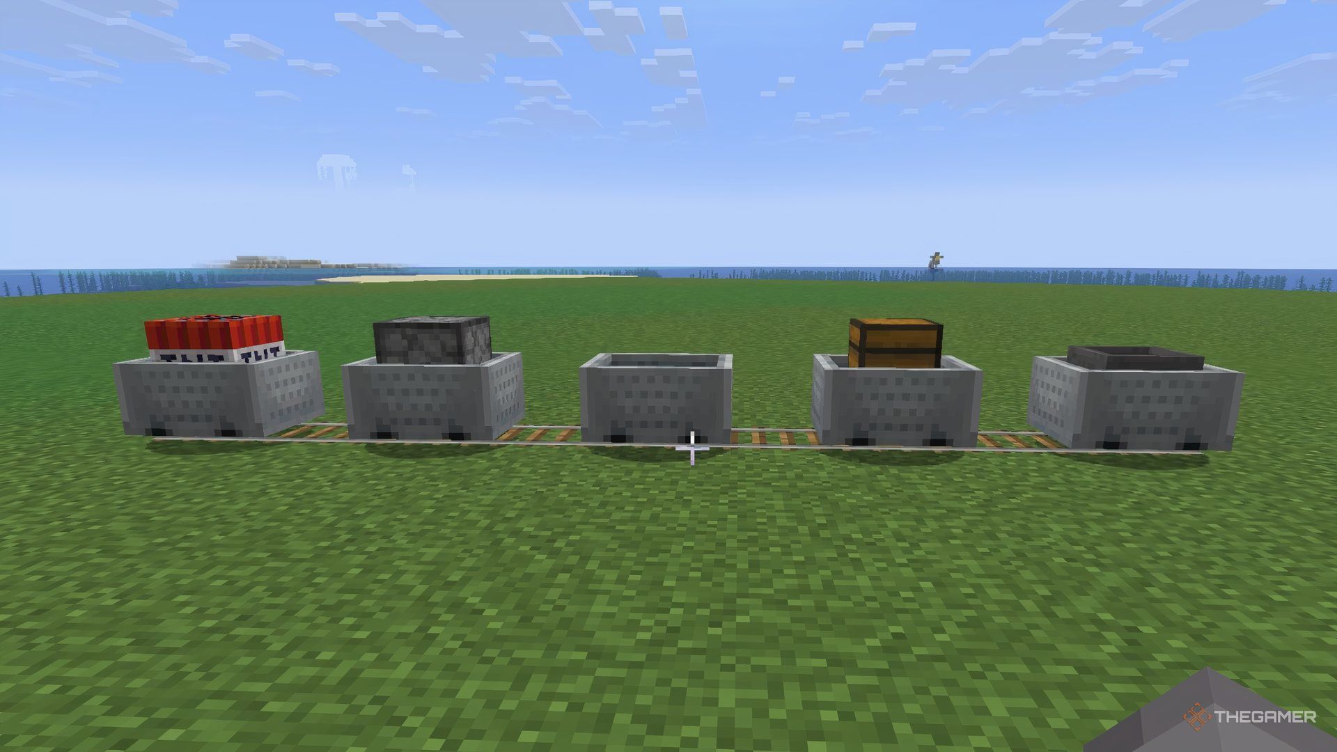 A line of minecarts in Minecraft on an island.