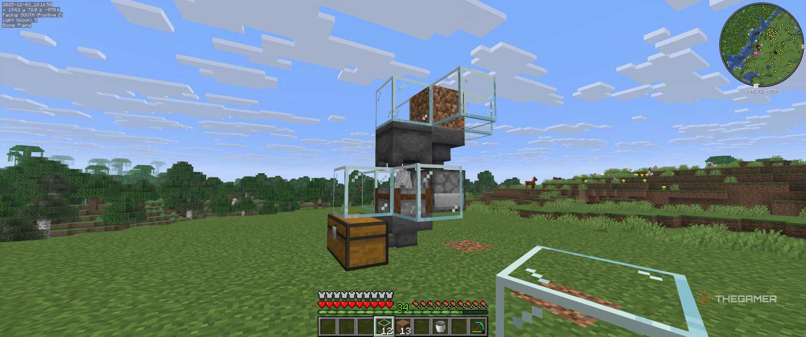 A chicken farm in minecraft with a block of dirt as a placeholder for adding glass.