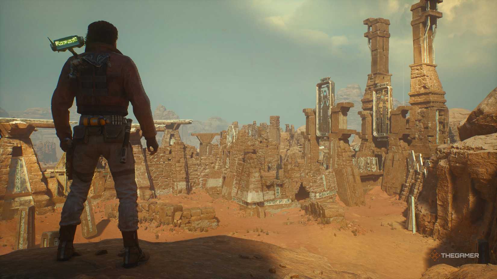 Cal Kestis standing on a ledge overlooking Jedha in Star Wars Jedi: Survivor.