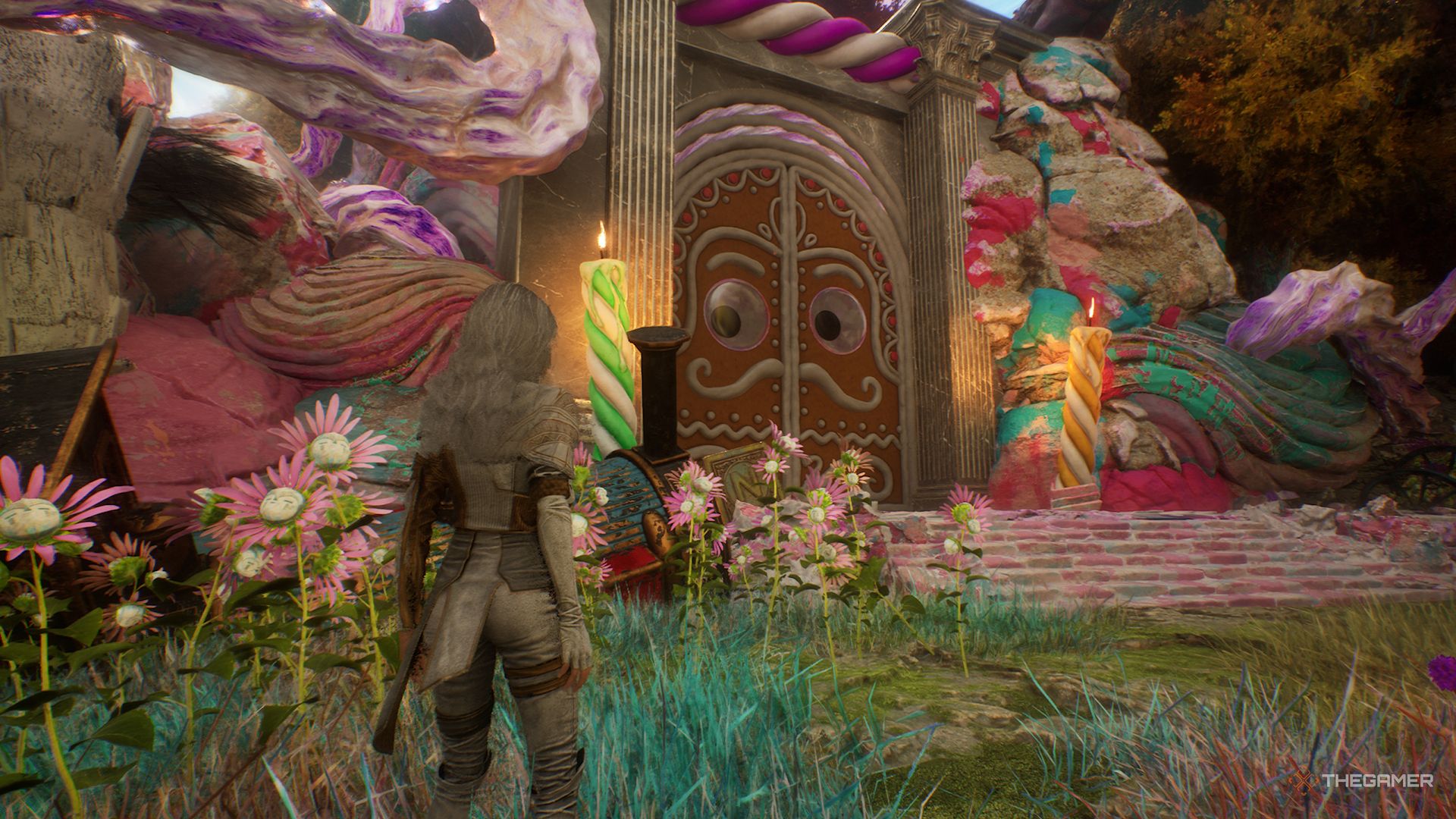 Maelle looking at a Gingerbread door in Clair Obscur: Expedition 33.