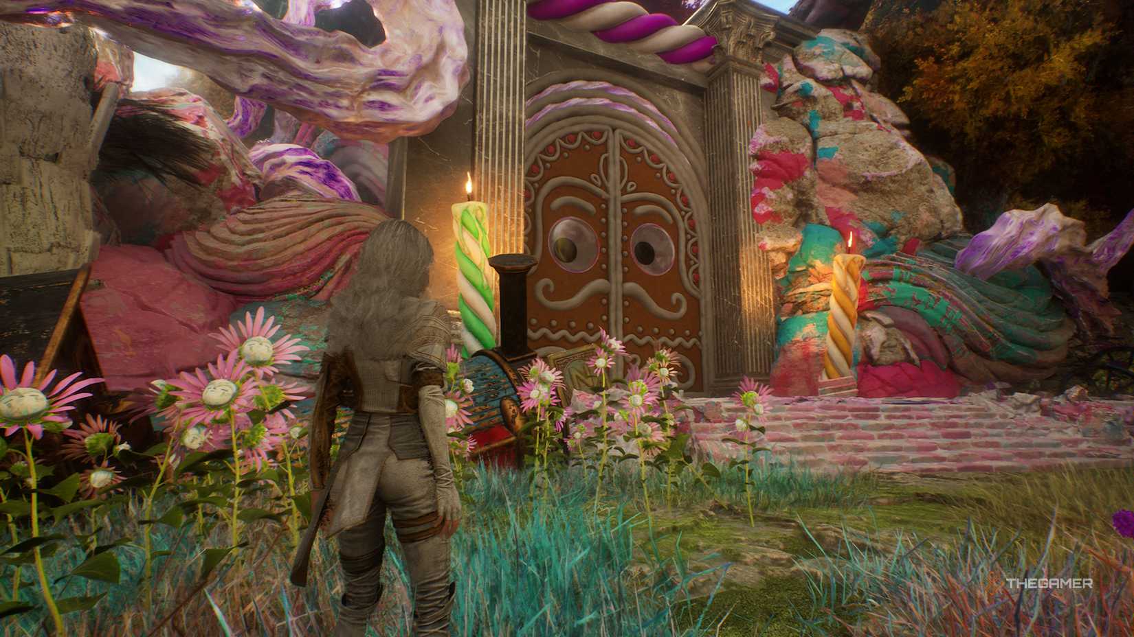 Maelle looking at a Gingerbread door in Clair Obscur: Expedition 33.