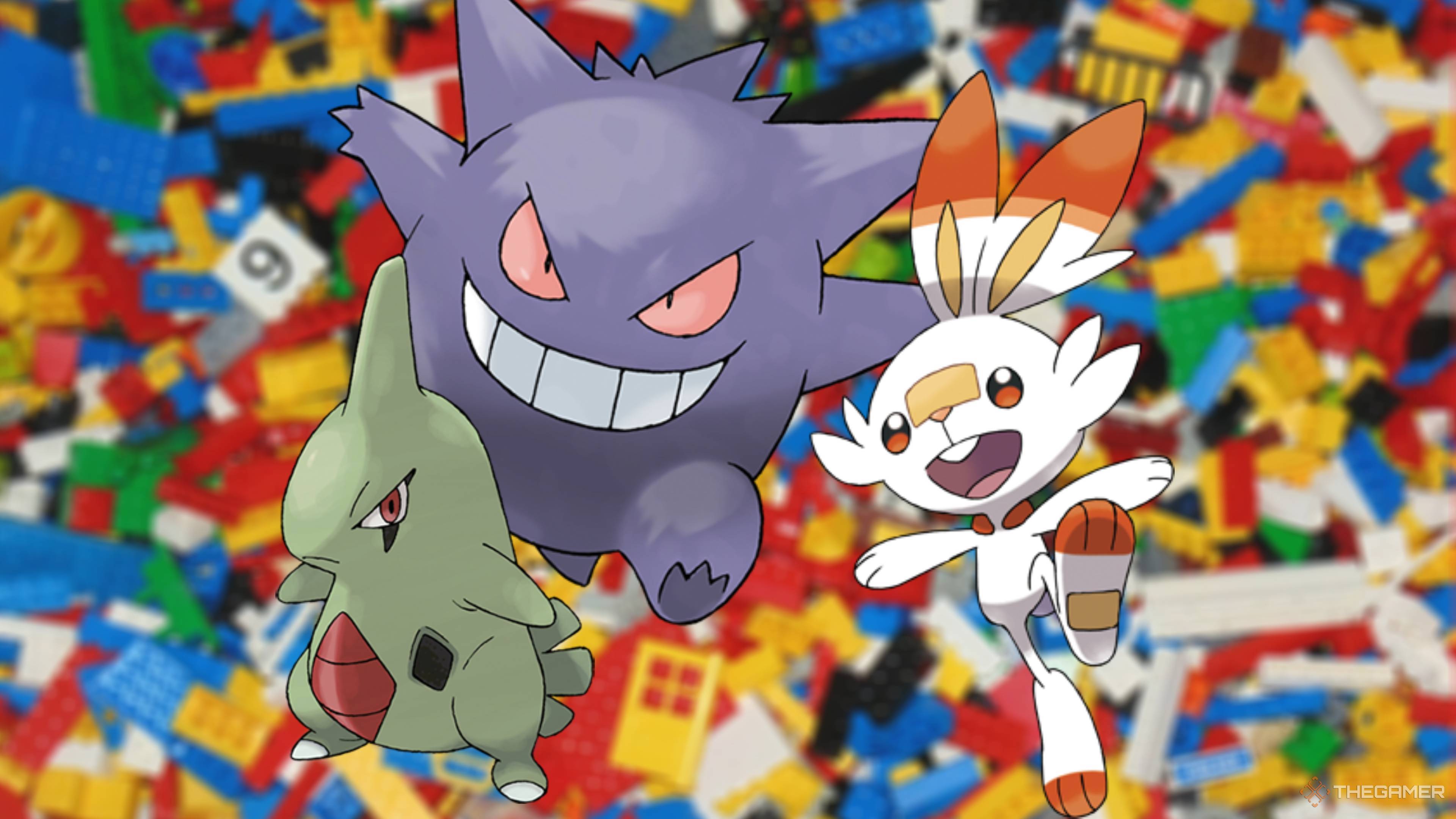 larvitar gengar and scorbunny on a blurred lego brick background.