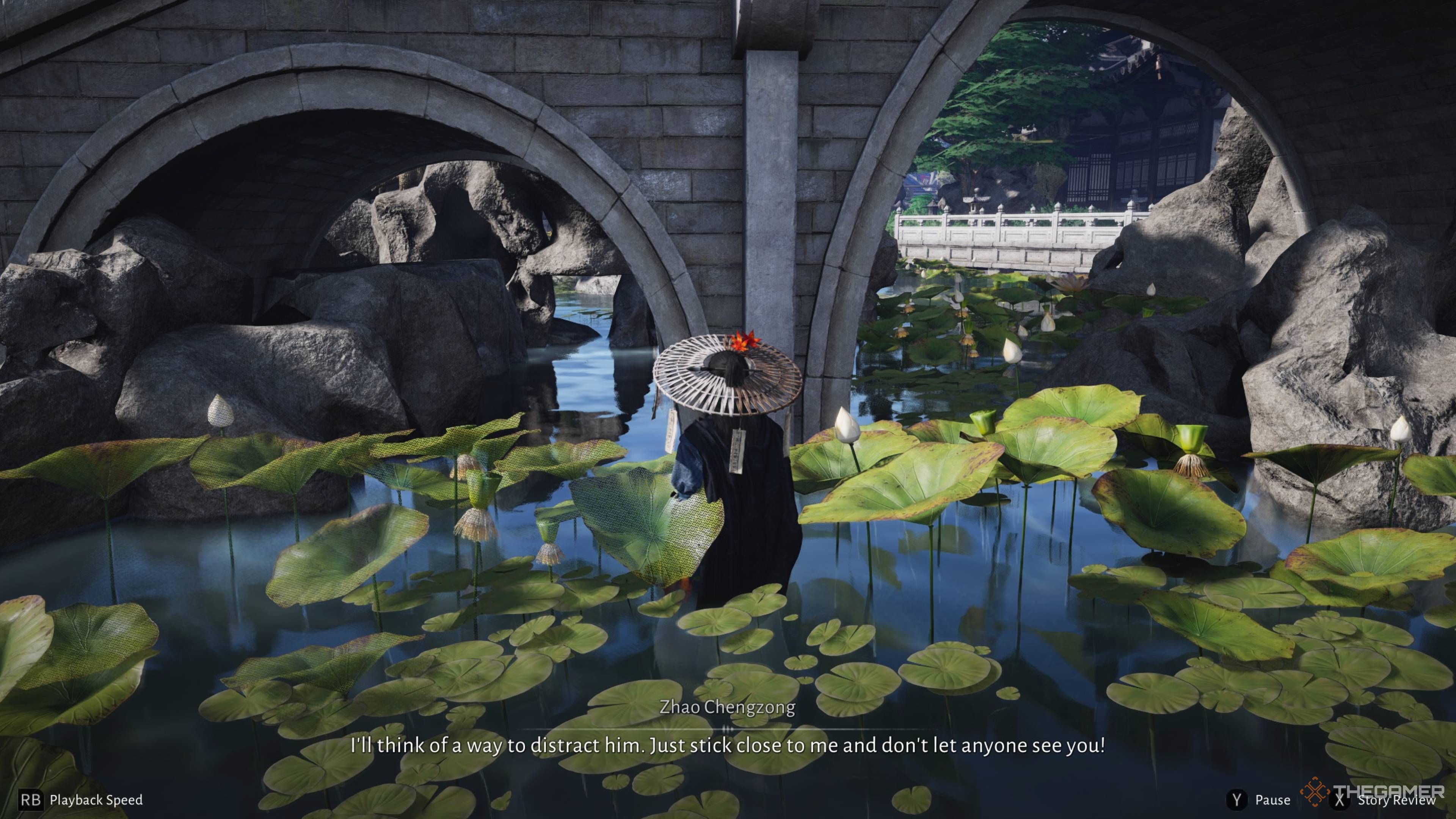 The player standing in water under a bridge being told to follow zhao in where winds meet.