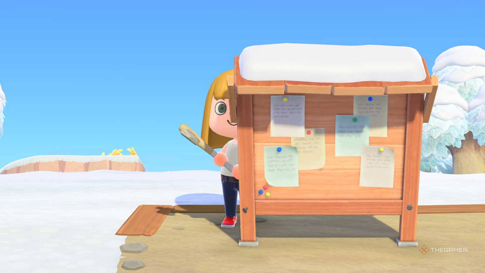 A player hiding behind a bulletin board with an ax in an animal crossing new horizons.