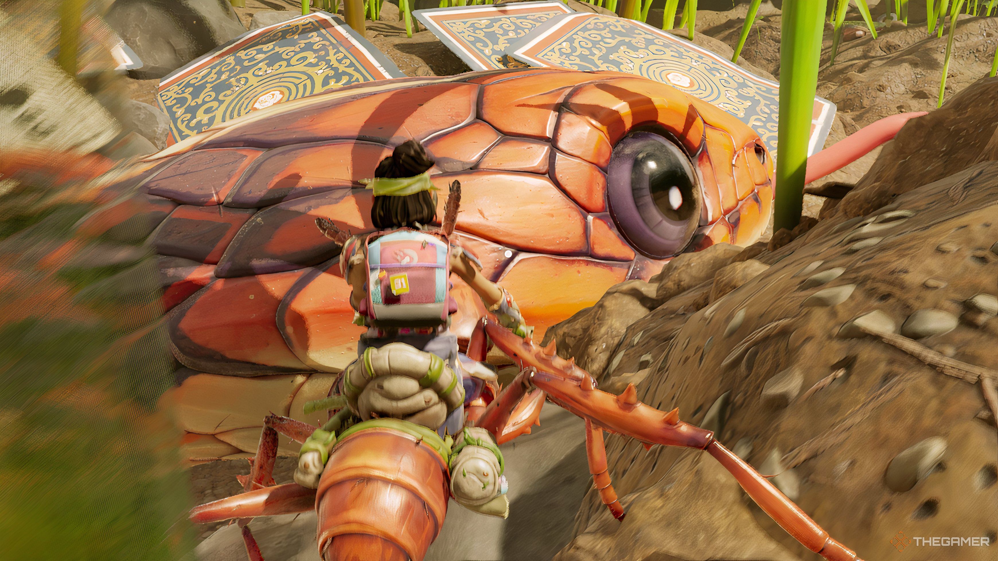 Grounded 2 character finding an orange snake.