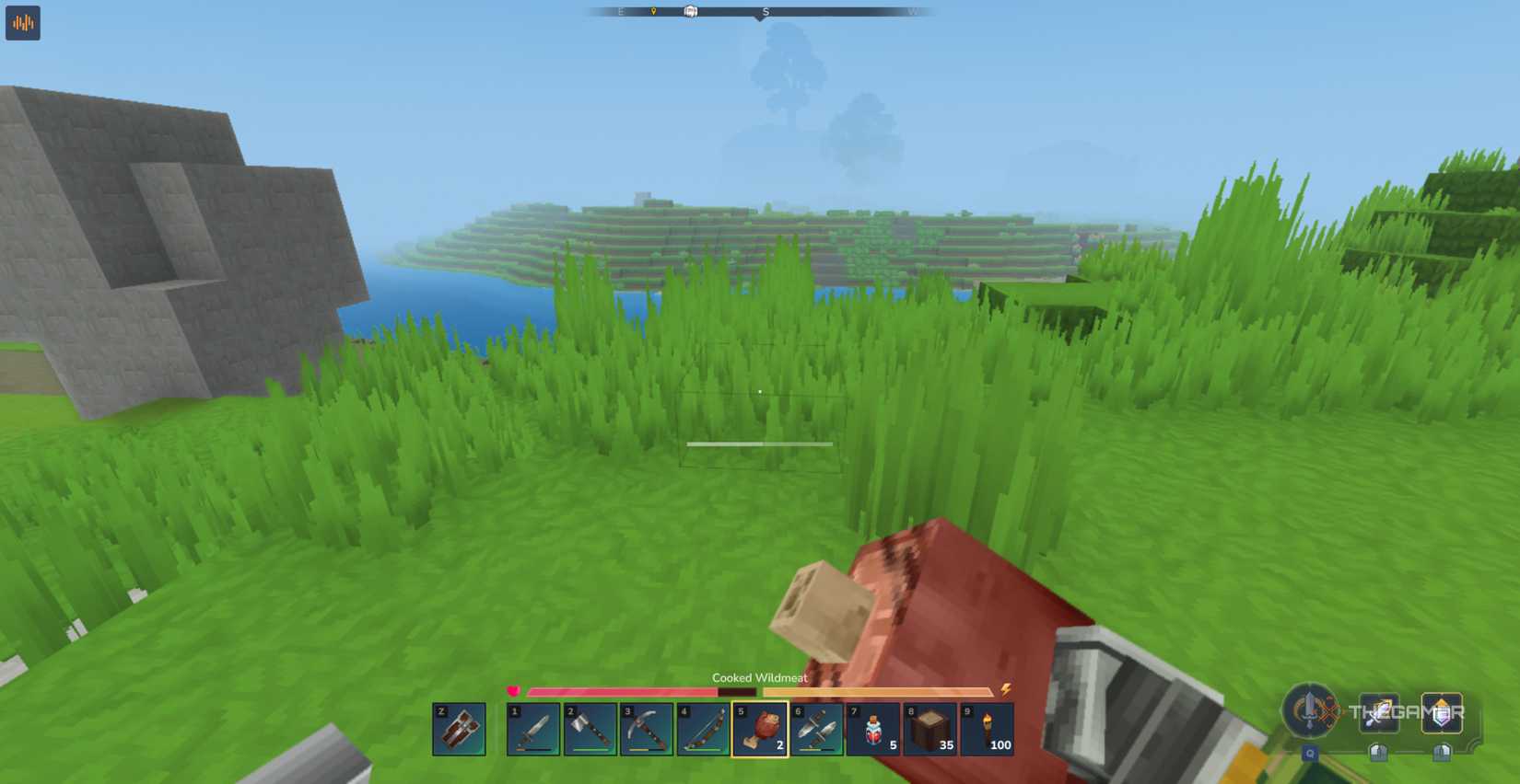 The player character eats a piece of cooked wild meat from his hotbar while traveling in Hytale.