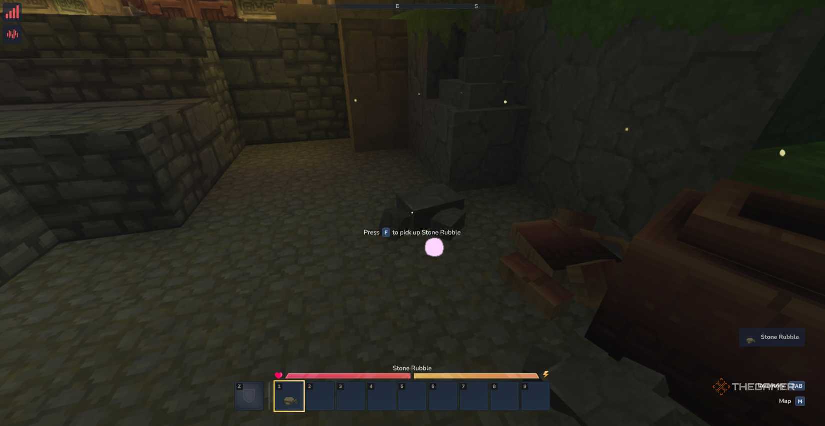 Newly spawned player picking up Stone Rubble from the ground in the spawn room in Hytale.