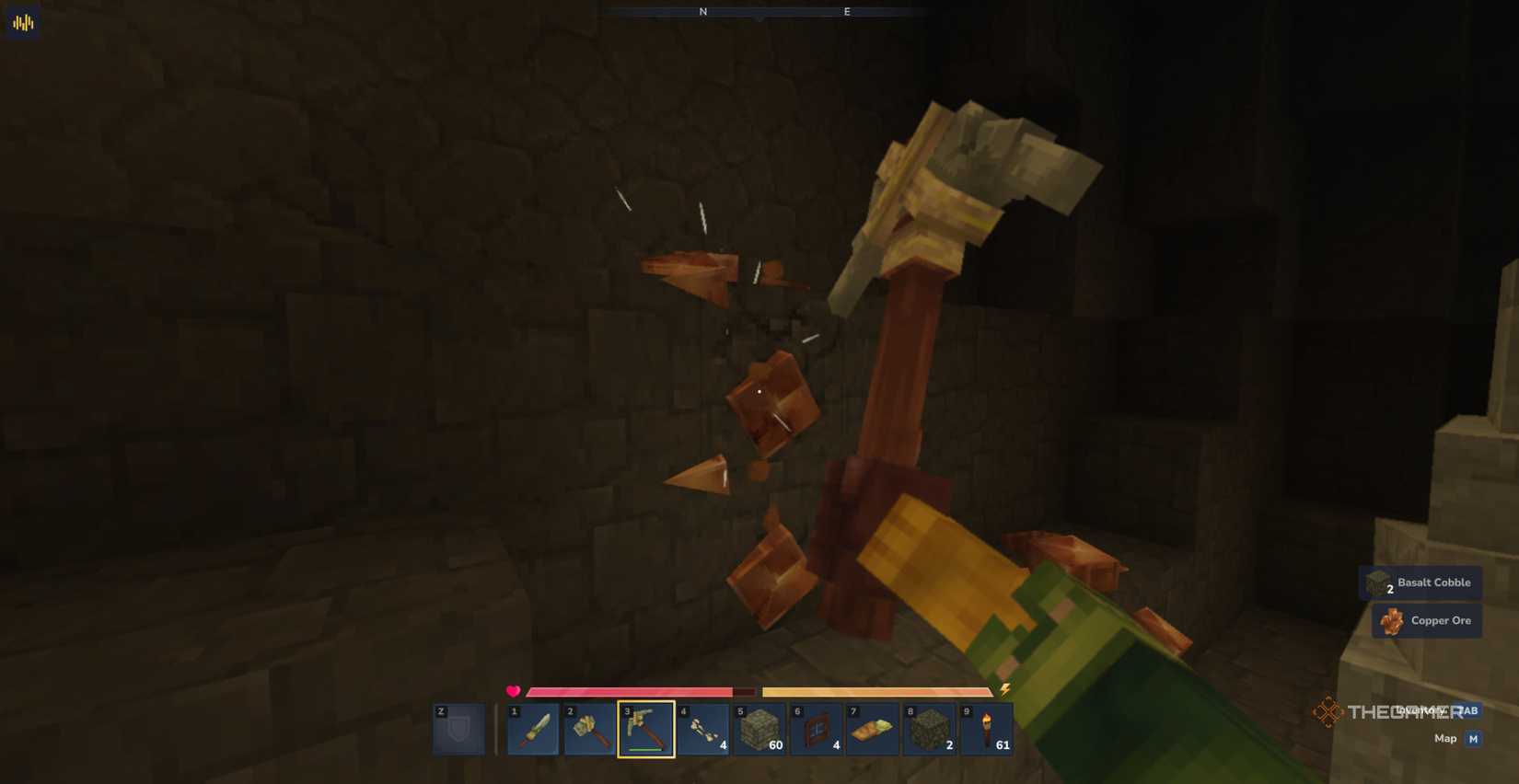 Player character mining Copper Ore in a Zone One cave with a Crude Pickaxe in Hytale.