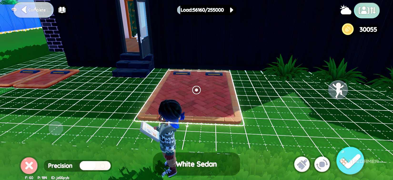 A player placing a parking lot on their home lot in Heartopia. 