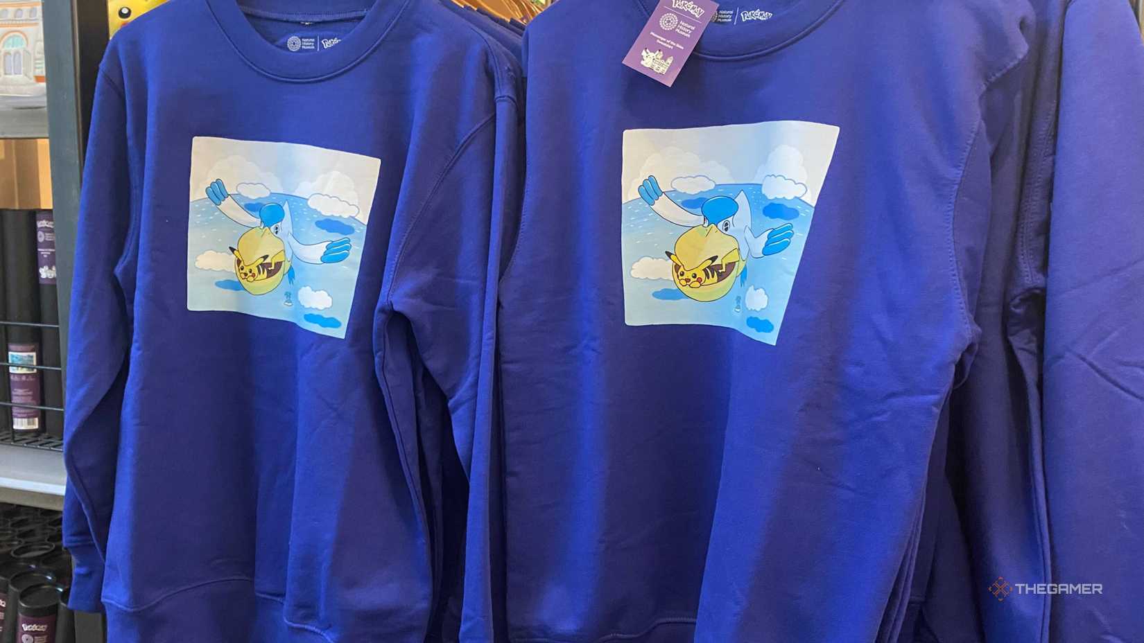 Felifer wearing a Pikachu sweatshirt.