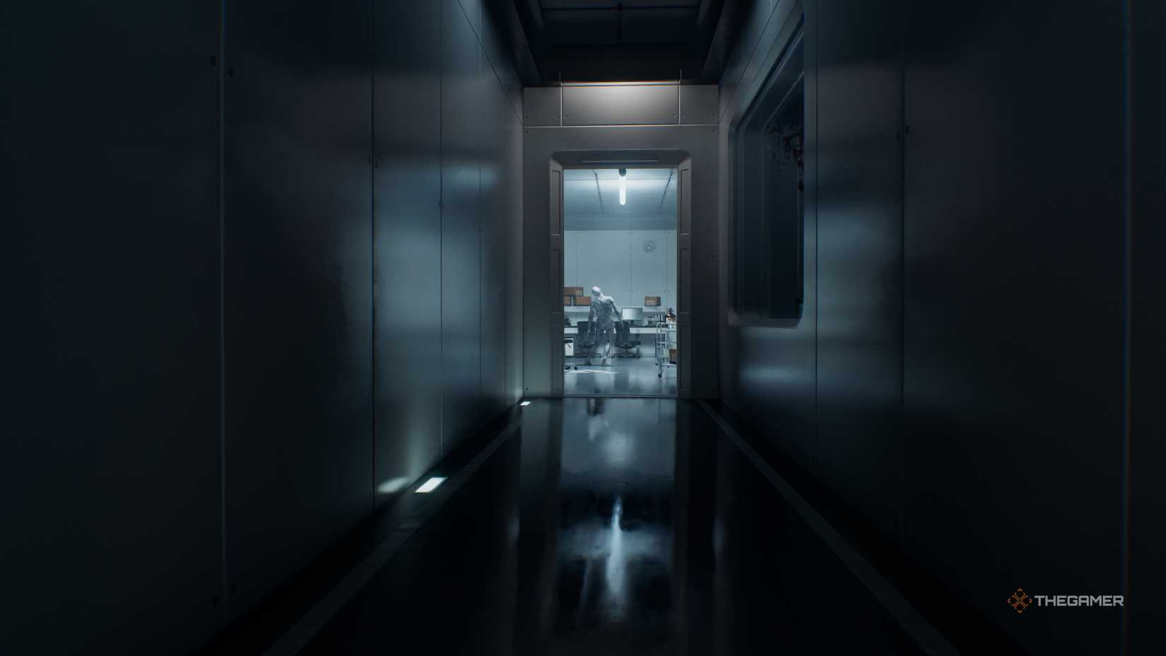 In the Umbrella Lab, Grace Ashcroft is looking through a door at a mutant monster in the hallway.