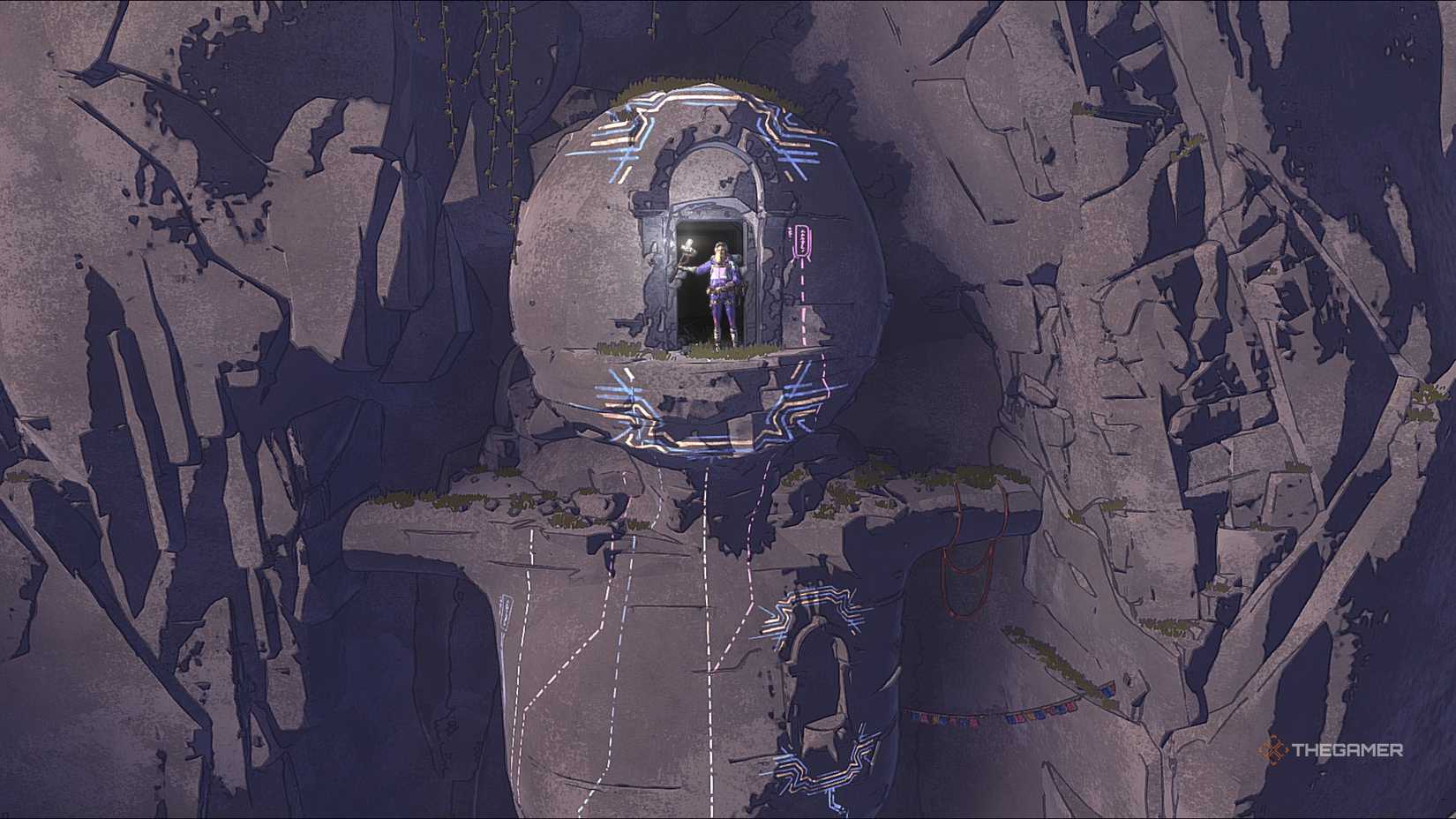 Aava in the head of a statue of a child in a cairn.