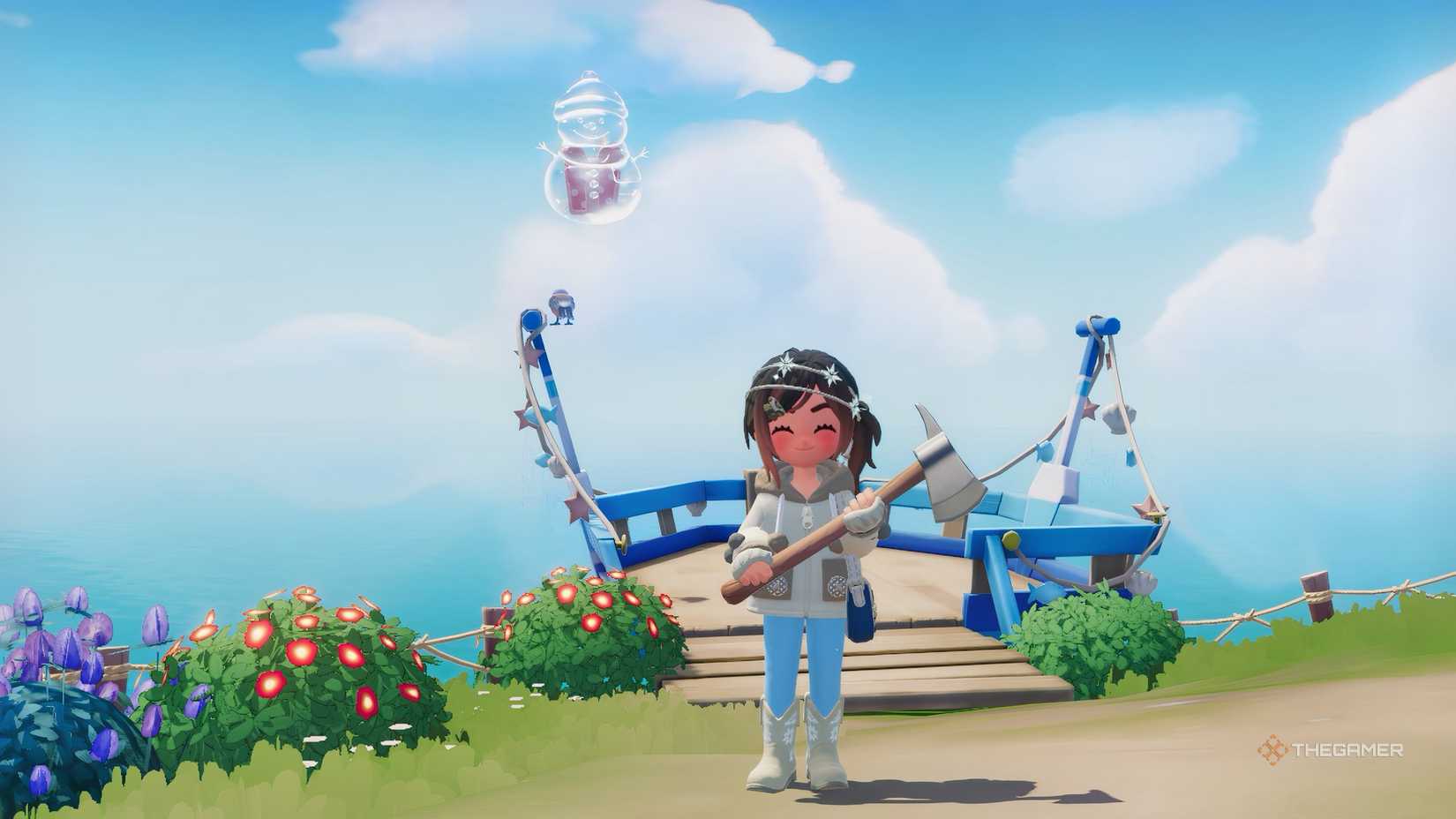 حباب آدم برفی Heartopia در نزدیکی شخصیتی با لباس زمستانی که تبر در دست دارد شناور است.