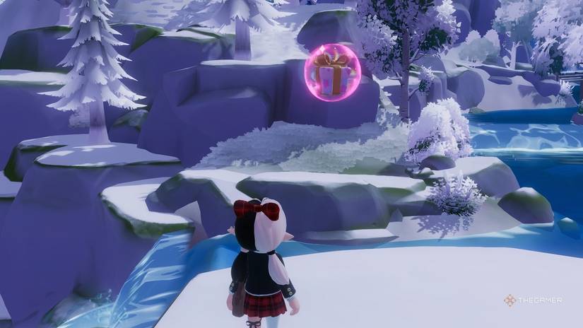Pink bubbles floating above the waterfall in Heartopia.