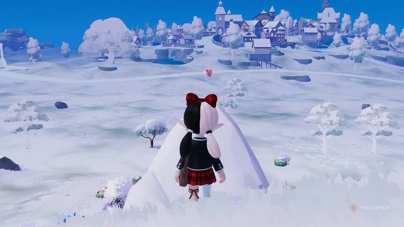 Pink bubbles float on the high rocks of Heartopia.