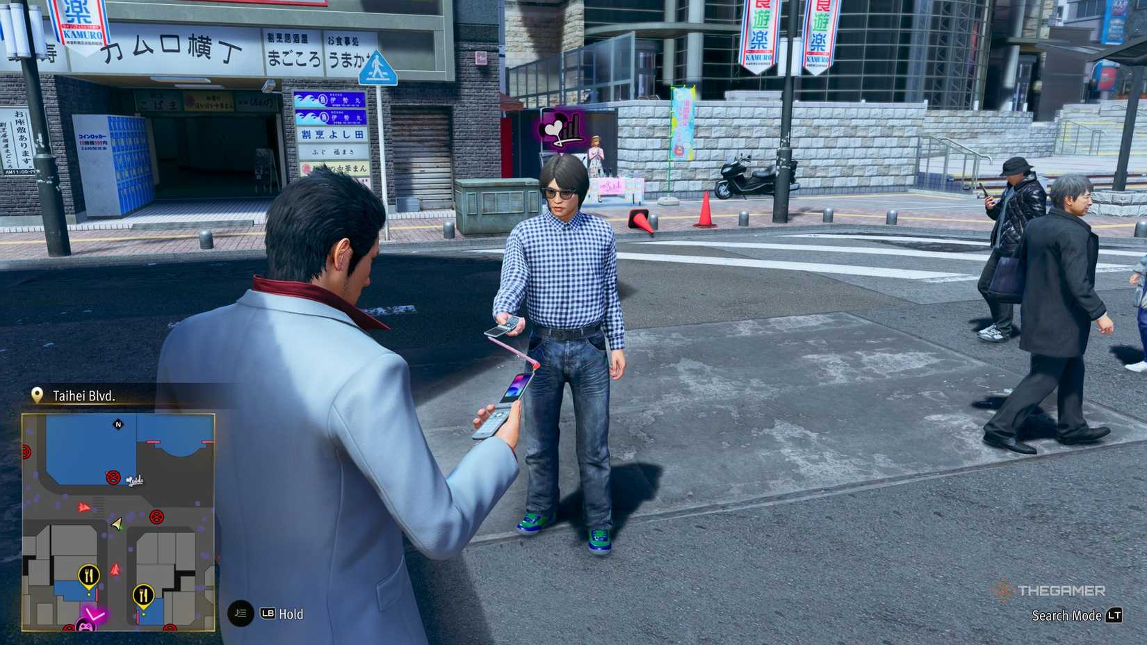 Kiryu befriending someone on his phone in Yakuza Kiwami 3.