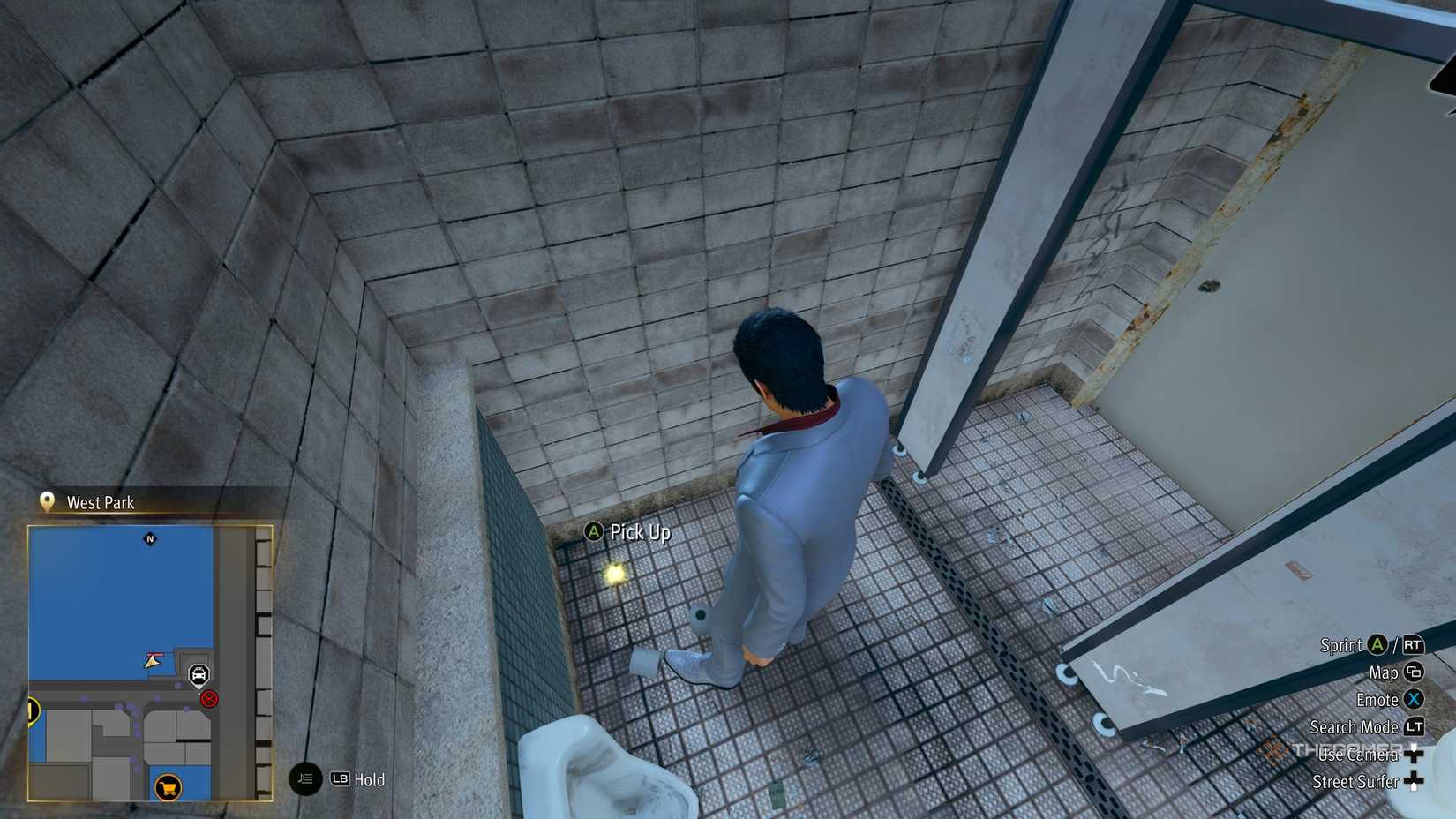 Kiryu next to the A2 Kamurocho locker key in Yakuza Kiwami 3.