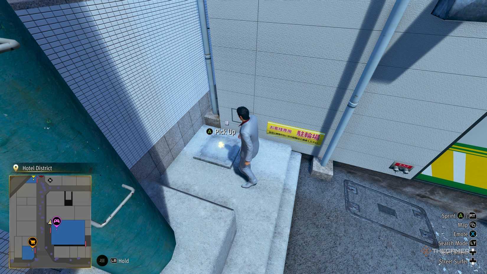 Kiryu next to the E1 Kamurocho locker key in Yakuza Kiwami 3.