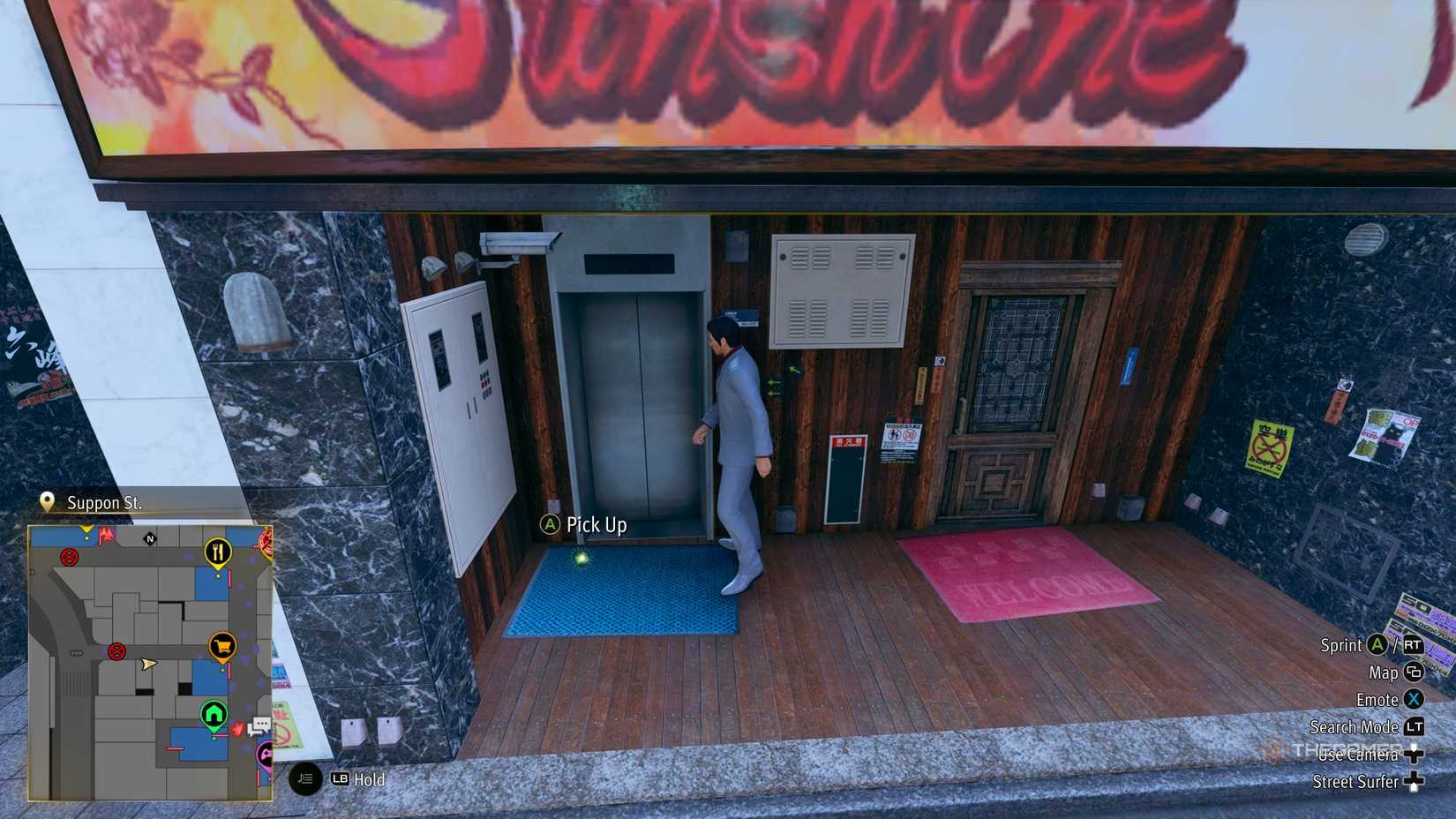 Kiryu next to the E3 Kamurocho locker key in Yakuza Kiwami 3.