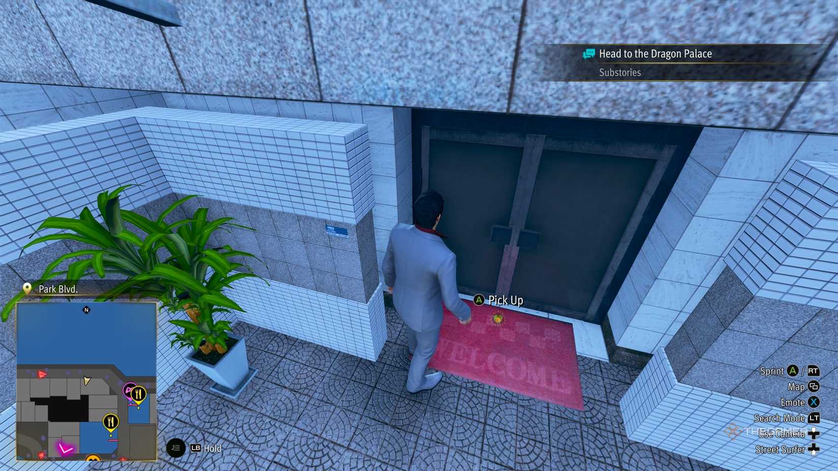 Kiryu next to the F1 Kamurocho locker key in Yakuza Kiwami 3.