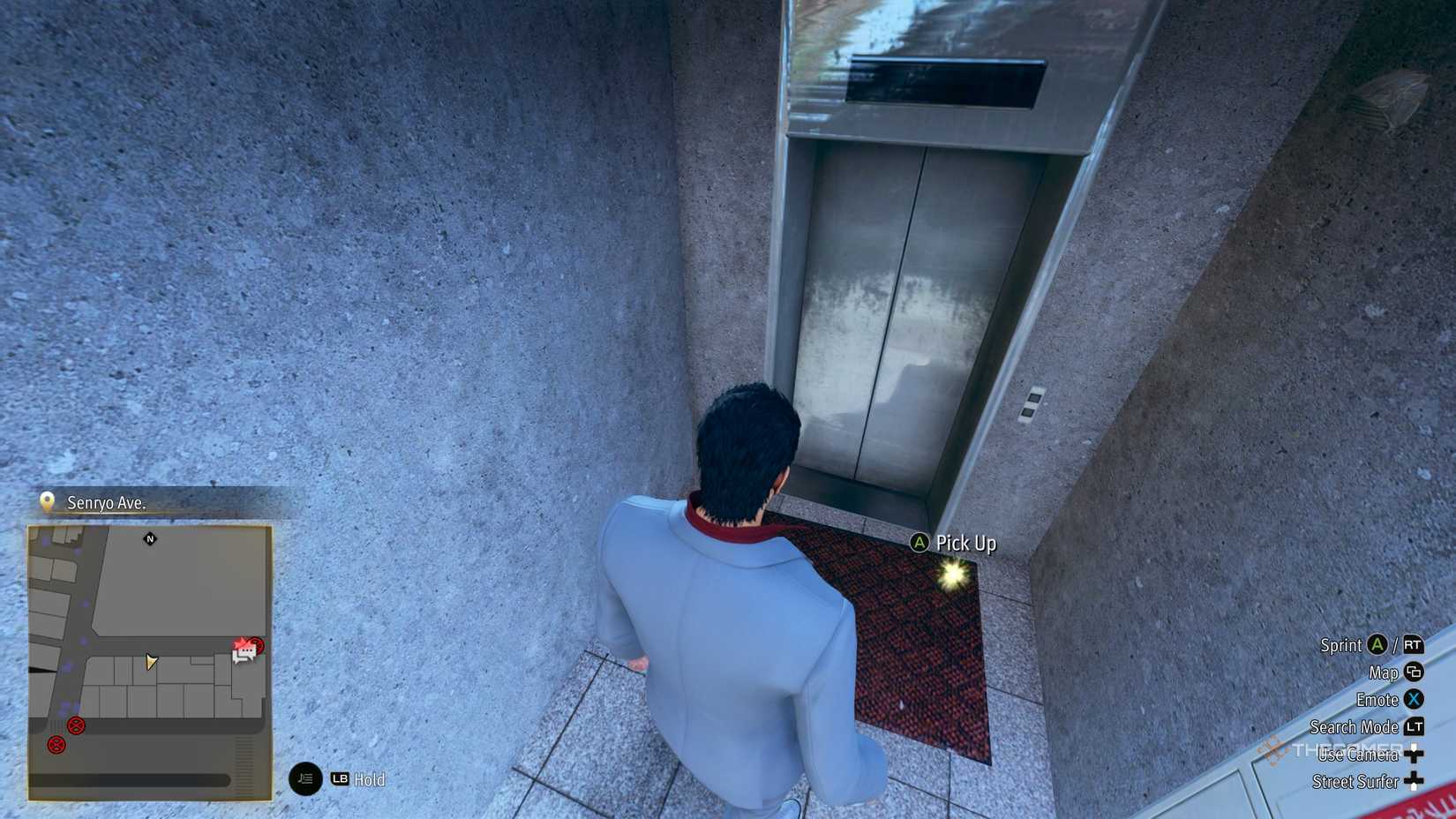 Kiryu next to the F2 Kamurocho locker key in Yakuza Kiwami 3.