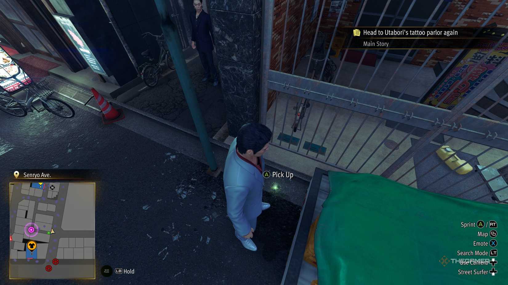 Kiryu next to the H2 Kamurocho locker key in Yakuza Kiwami 3.