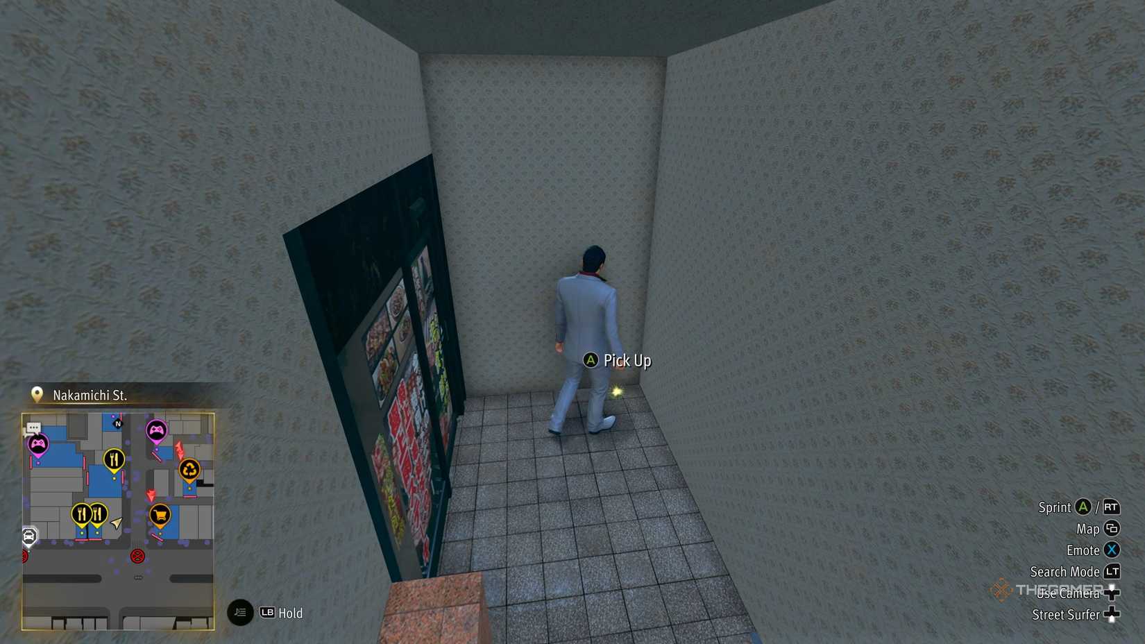 Kiryu next to the J2 Kamurocho locker key in Yakuza Kiwami 3.