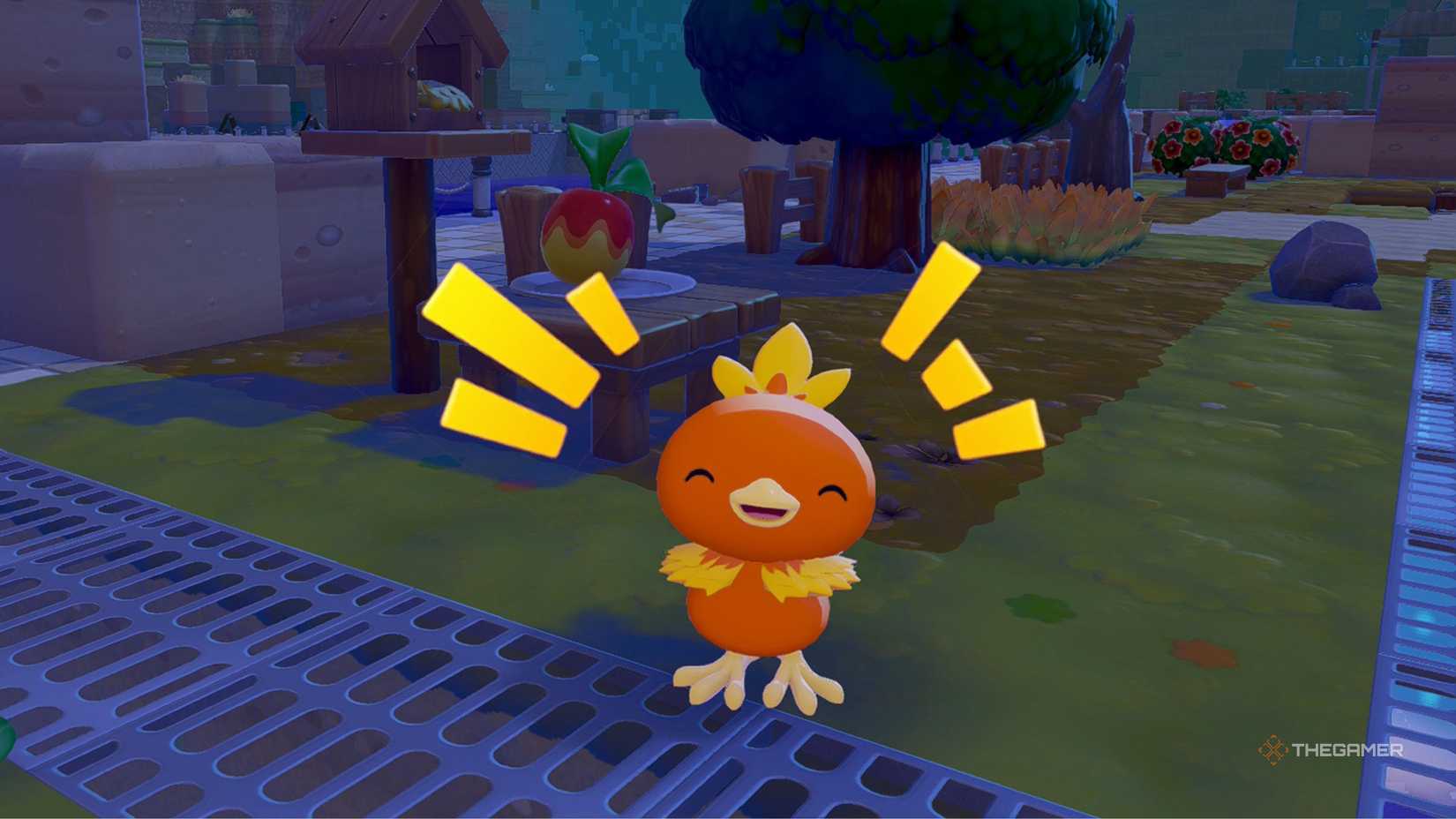 Pokemon Pokopia a happy Torchic in front of a habitat