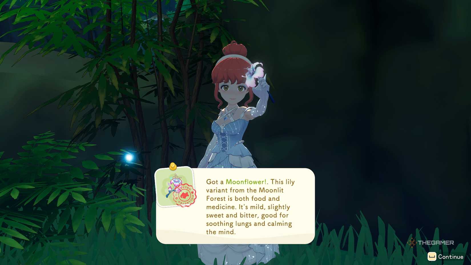 Holding a moon flower in a cave on Starsand Island.