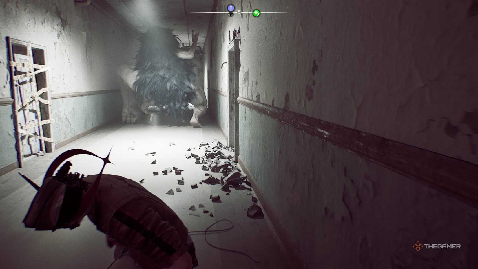 Behind the hairy monster in Romeo is a dead man.