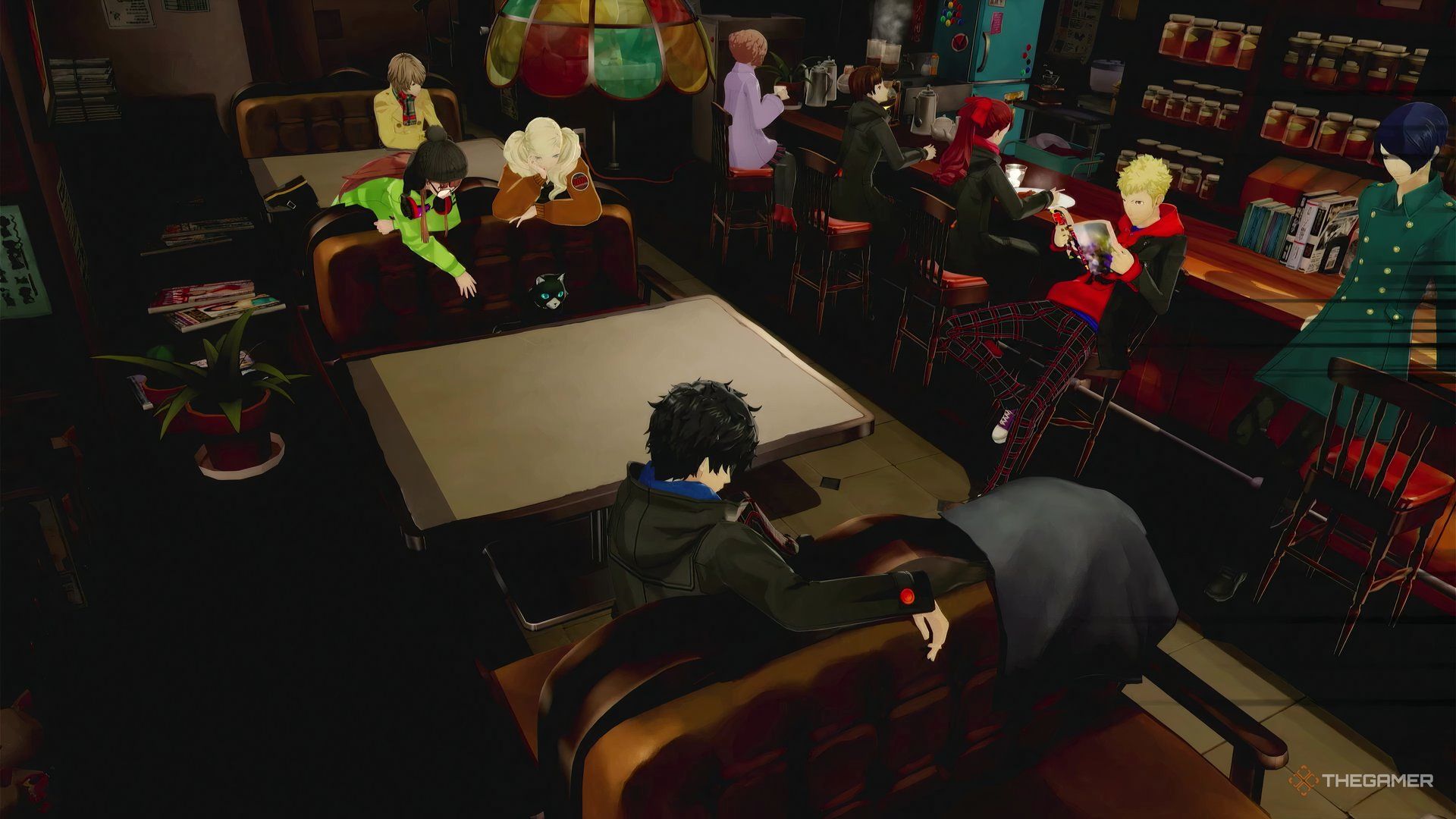 The whole team of Phantom Thieves party members in Persona 5 Royal at the Hideout in Cafe Leblanc.