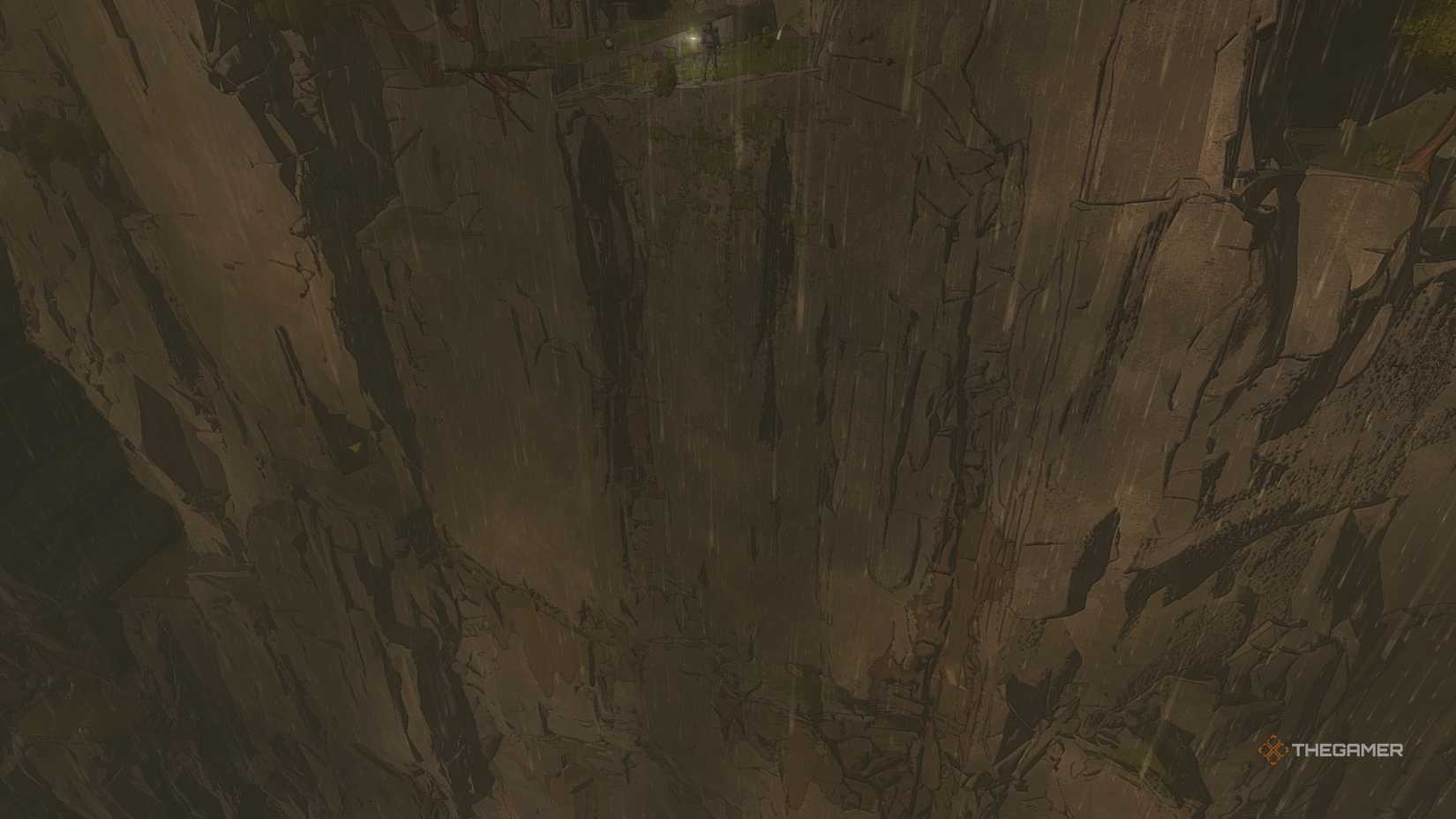 A close-up of Aave on top of the cairn cliff.