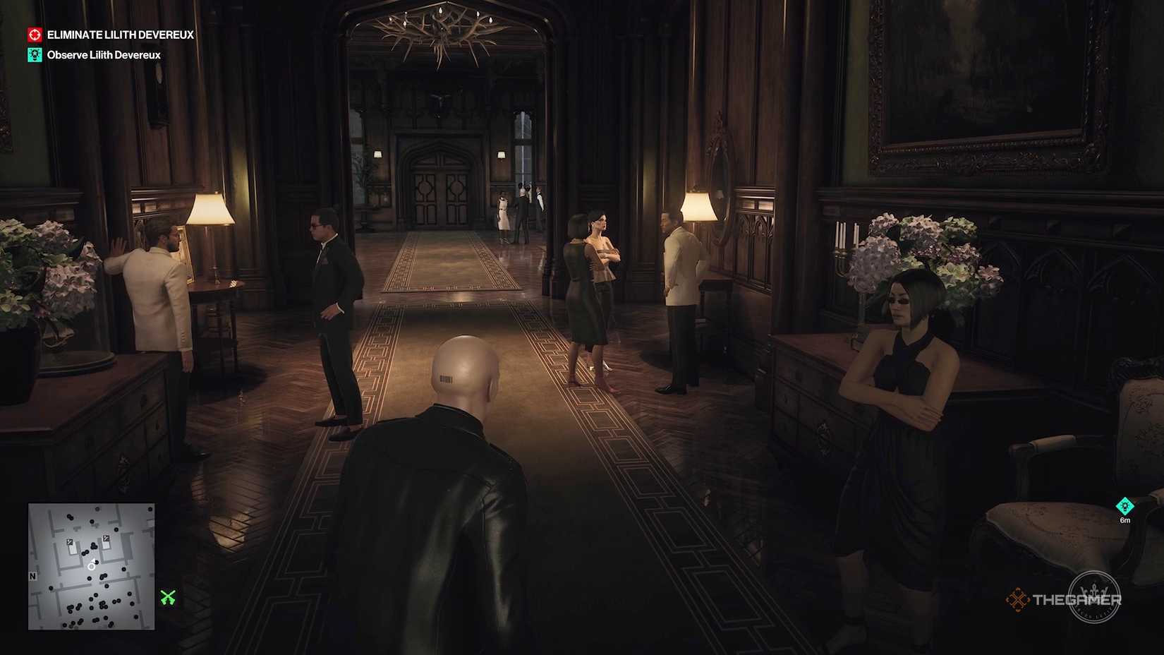 Agent 47 going toward a group of people in Hitman World of Assassination.