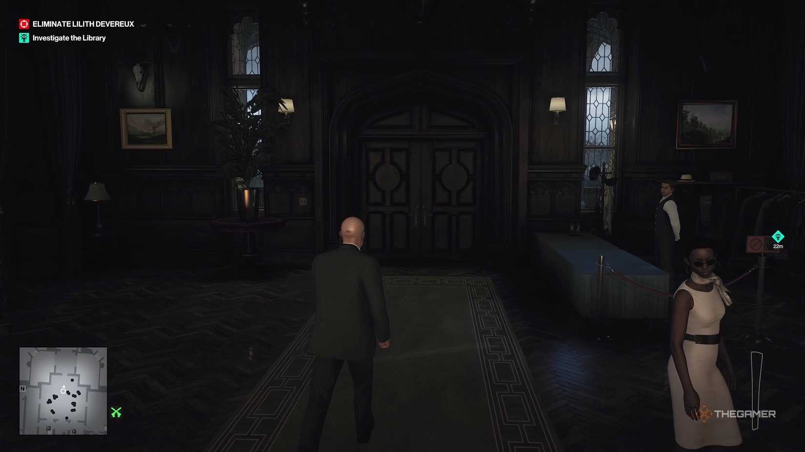 Agent 47 walking toward fron door in Hitman World of Assassination.