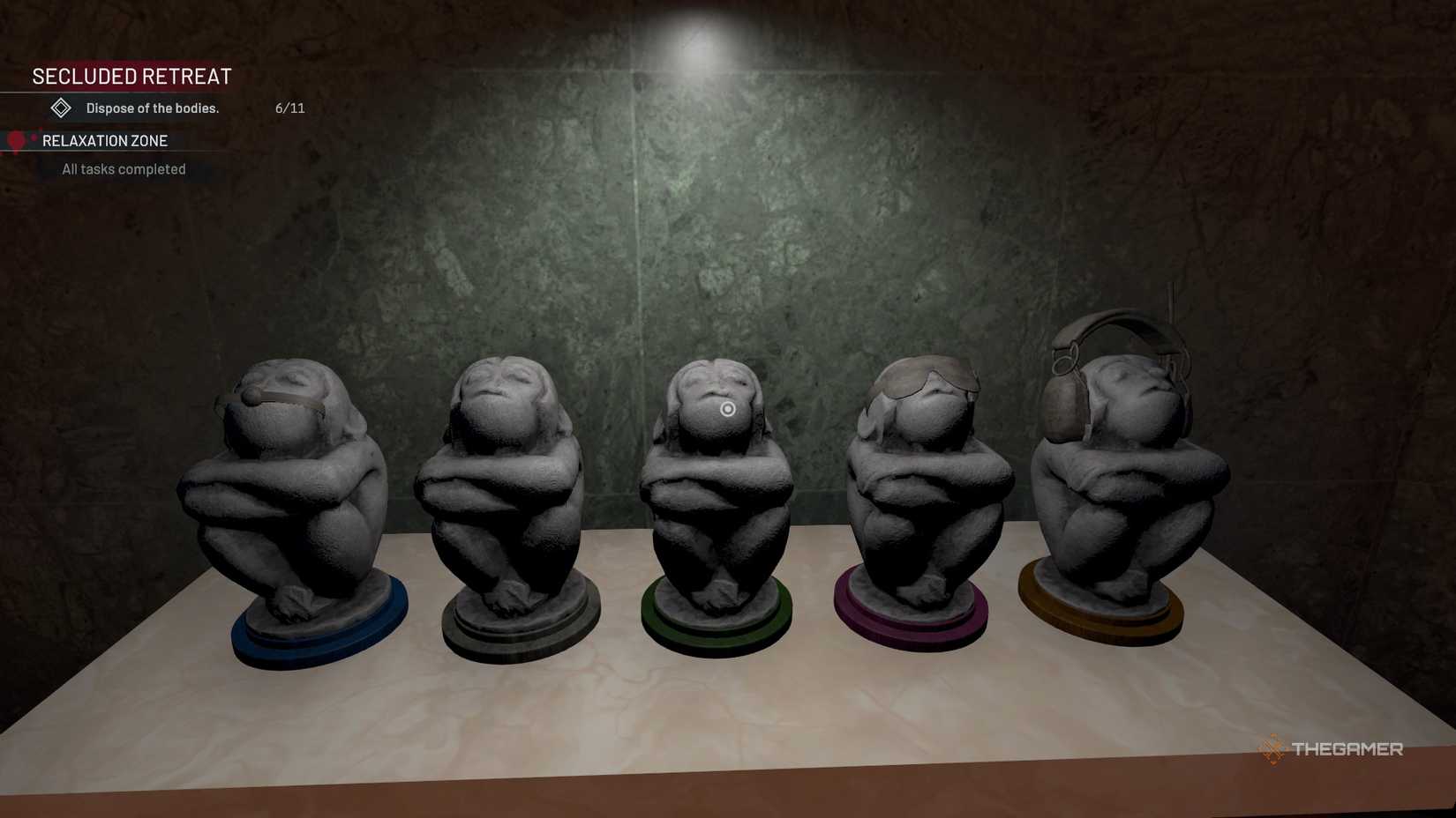 Crime Scene Cleaner monkey statues lined up.