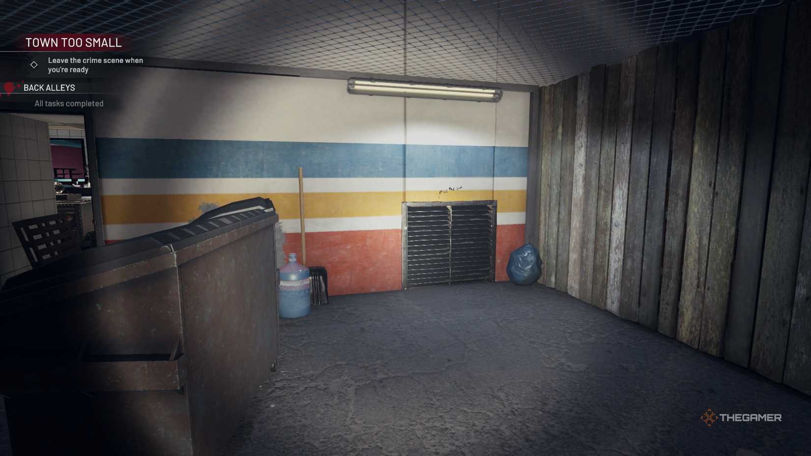 Crime Scene Cleaner in the back looking at a valve.