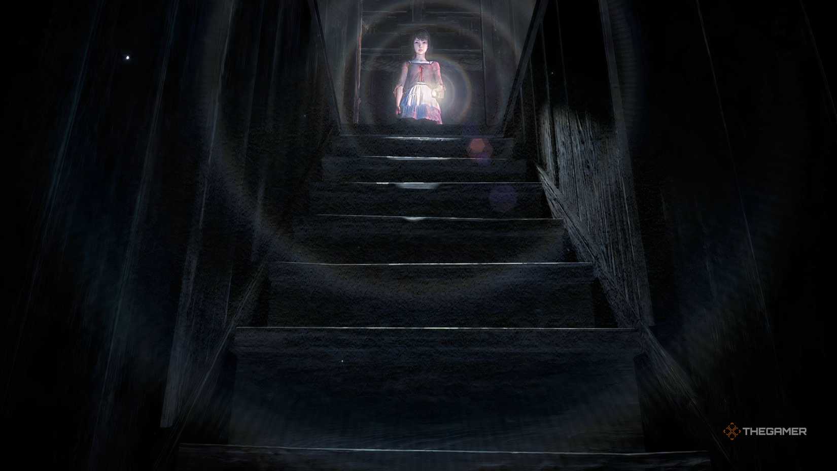 Fatal Frame II Crimson Butterfly Mio looking down the stairs.