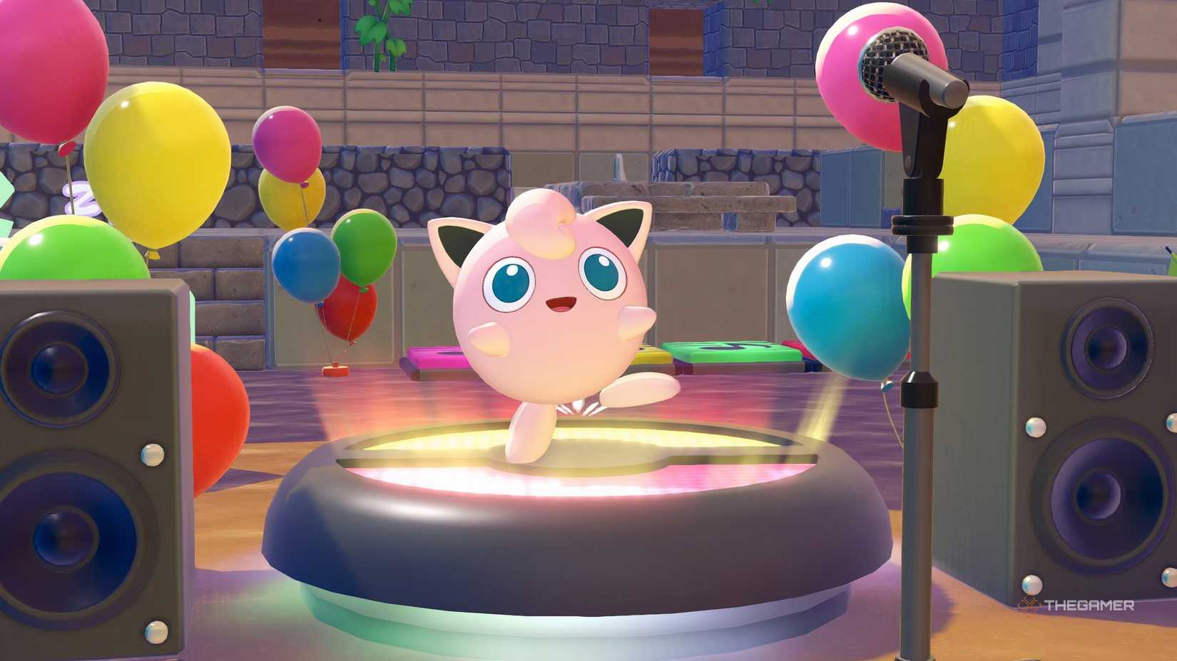 Jigglypuff singing and performing on a stage at the Pokemon Pokopia.