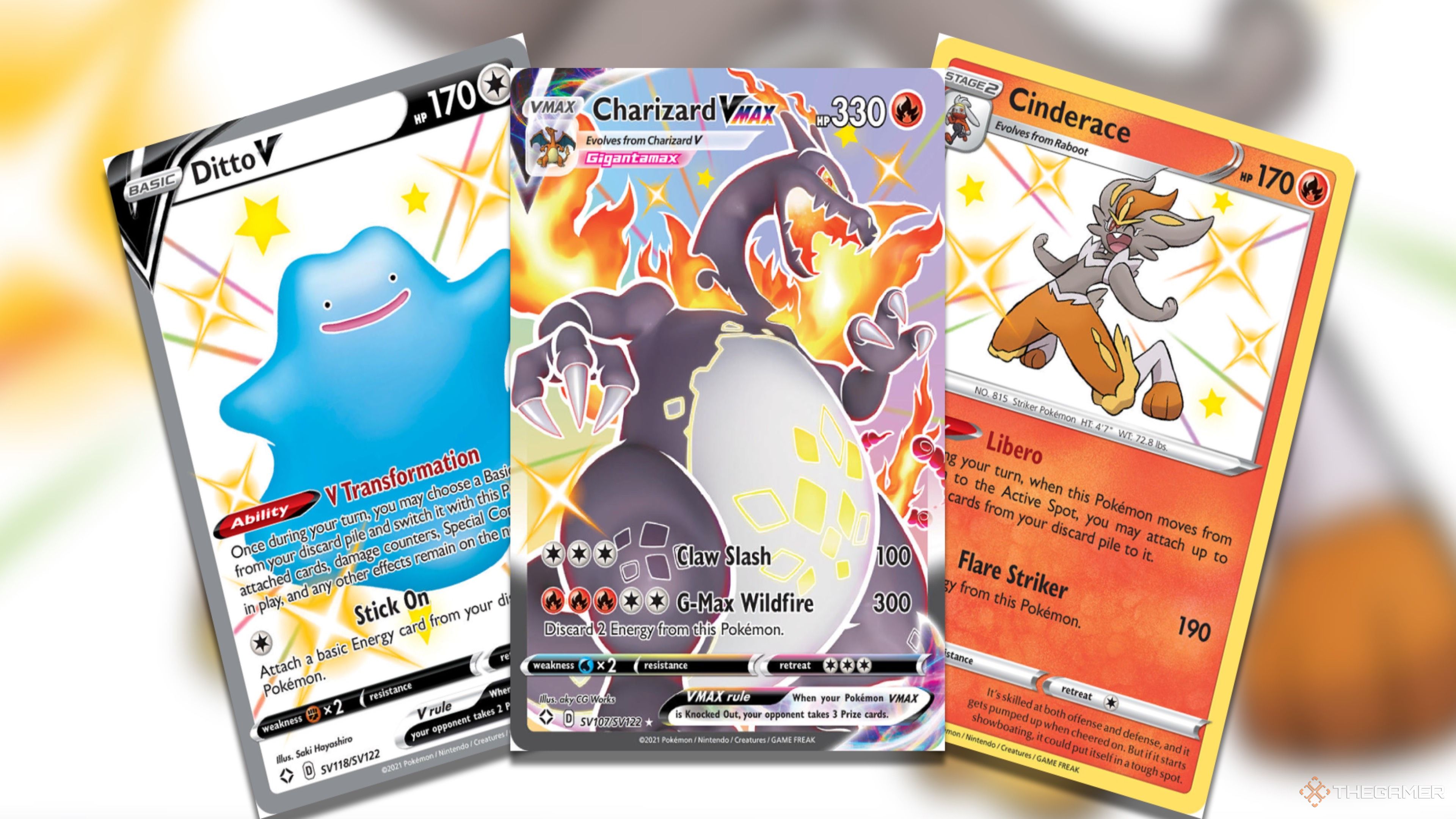 Three precious Shiny Fate cards: Ditto V Shiny Holo Rare, Charizard VMAX Shiny Holo Rare, and Cinderace Shiny Holo Rare from the Pokemon TCG.